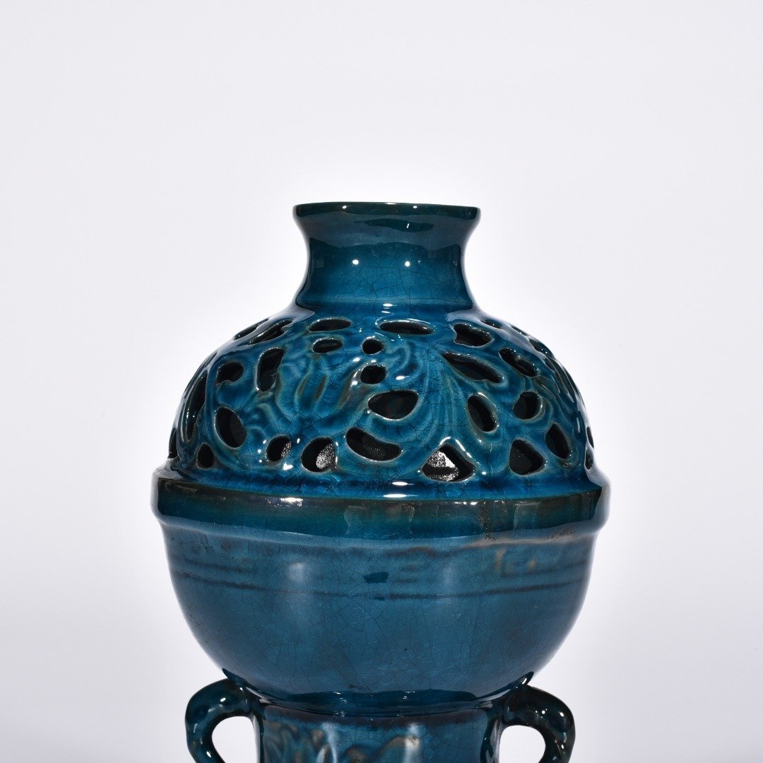 Five Dynasties Chai porcelain peacock blue glaze hollow flower pattern vase
