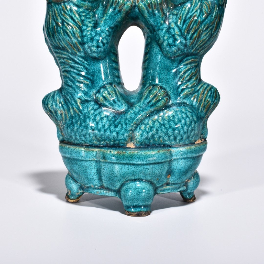 Five Dynasties Chai porcelain peacock green glaze lion playing boy vase