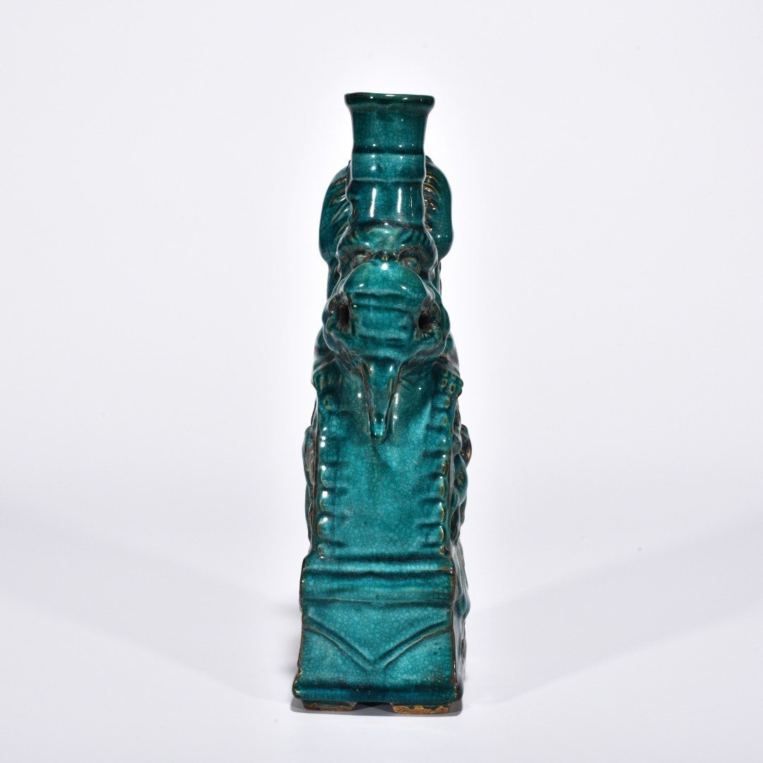 Five Dynasties Chai porcelain peacock green glaze lion and beast candlestick