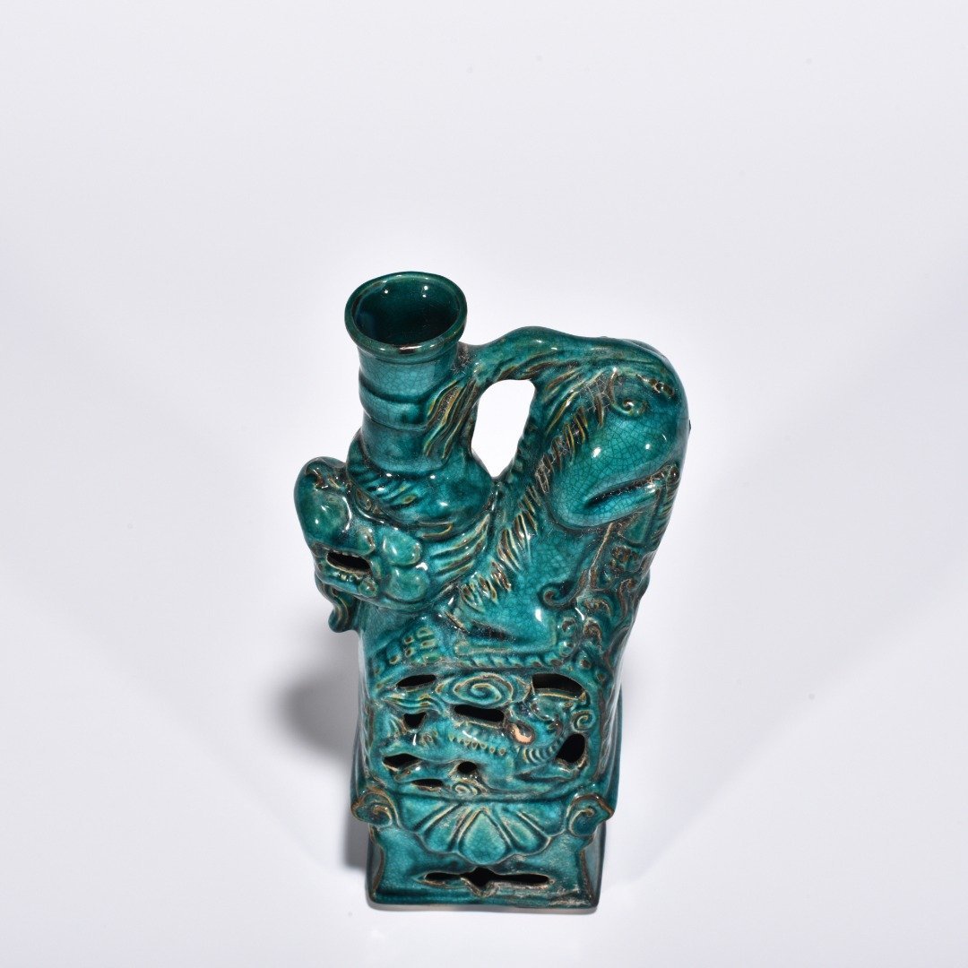 Five Dynasties Chai porcelain peacock green glaze lion and beast candlestick
