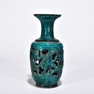 Five Dynasties Chai porcelain peacock green glaze hollow bottle with auspicious animal