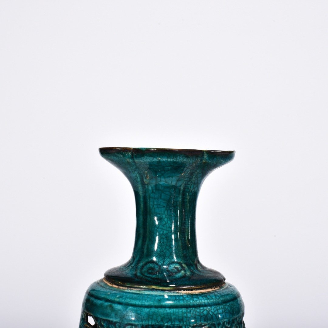 Five Dynasties Chai porcelain peacock green glaze hollow bottle with auspicious animal