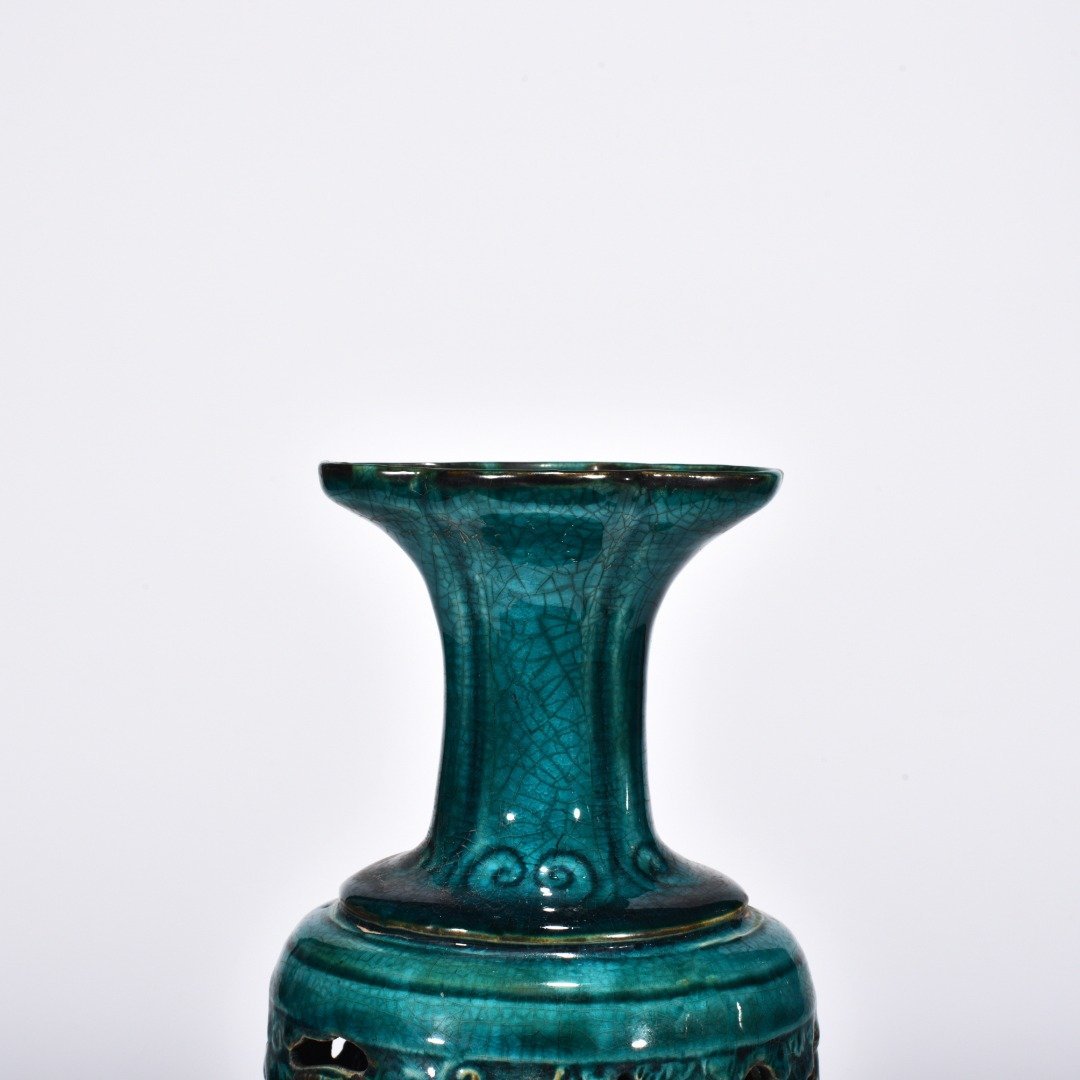 Five Dynasties Chai porcelain peacock green glaze hollow bottle with auspicious animal
