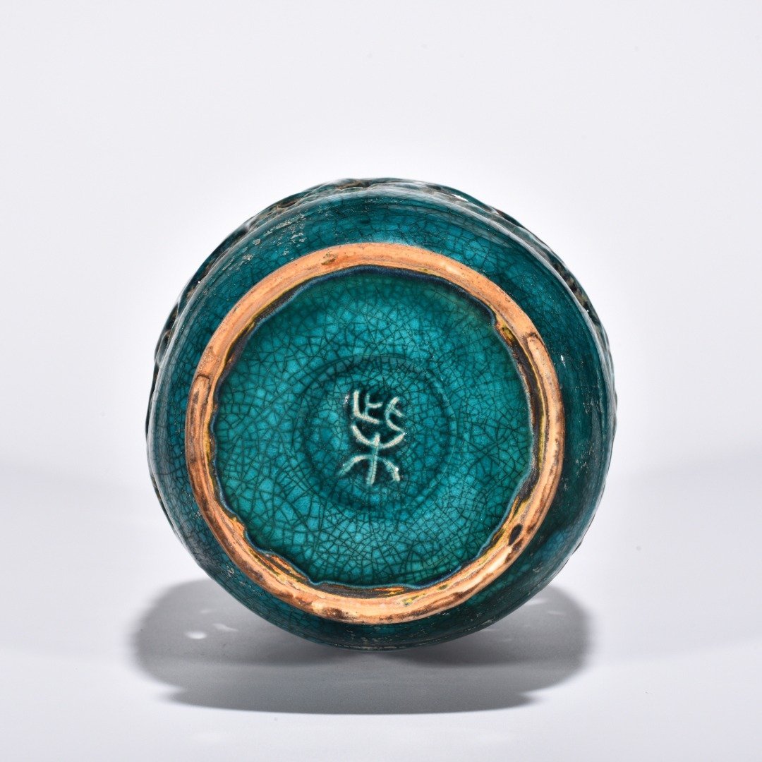 Five Dynasties Chai porcelain peacock green glaze hollow bottle with auspicious animal