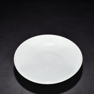 Yuan Dynasty egg white glaze engraved cloud and dragon pattern plate