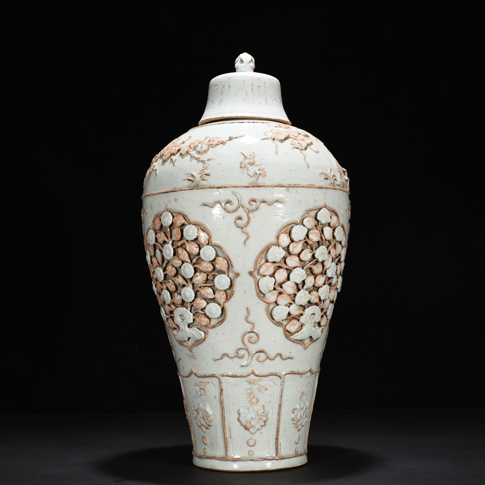 Yuan Dynasty egg white glazed plastic plum vase with four seasons flower pattern