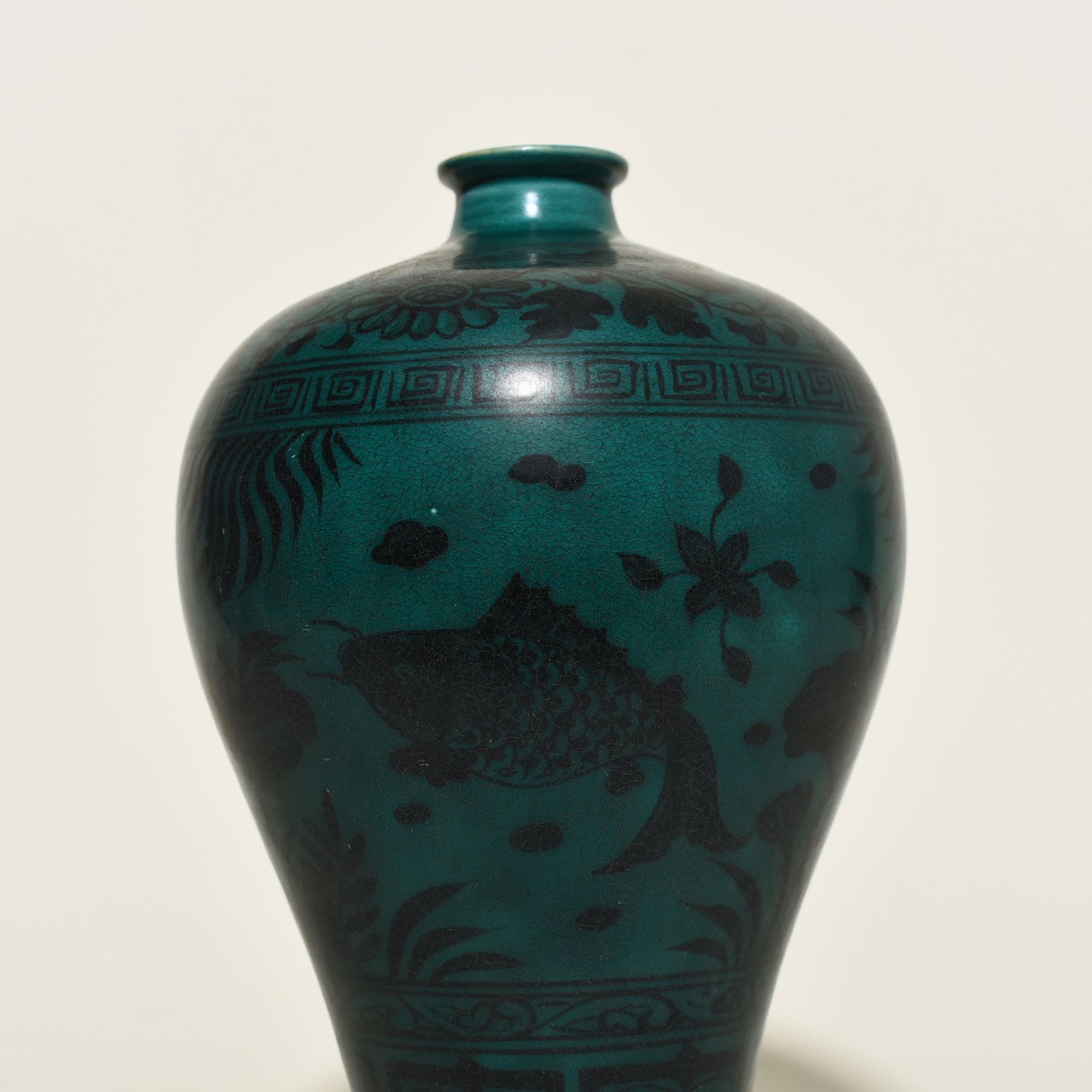 Yuan Dynasty peacock blue glaze fish and algae pattern plum vase