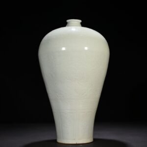 Yuan Dynasty white glaze carved plum vase with peony pattern