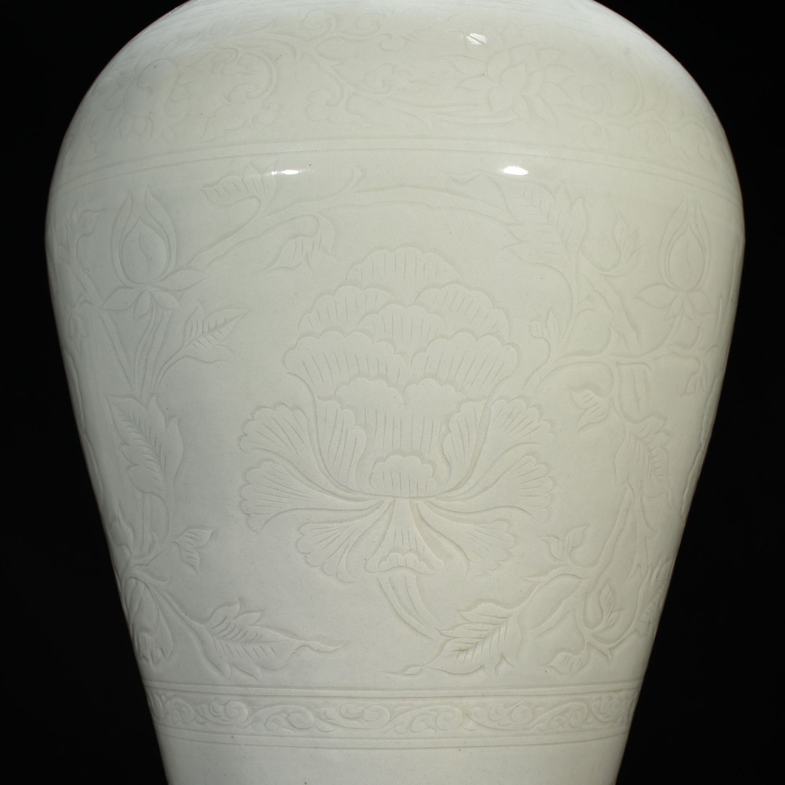 Yuan Dynasty white glaze carved plum vase with peony pattern