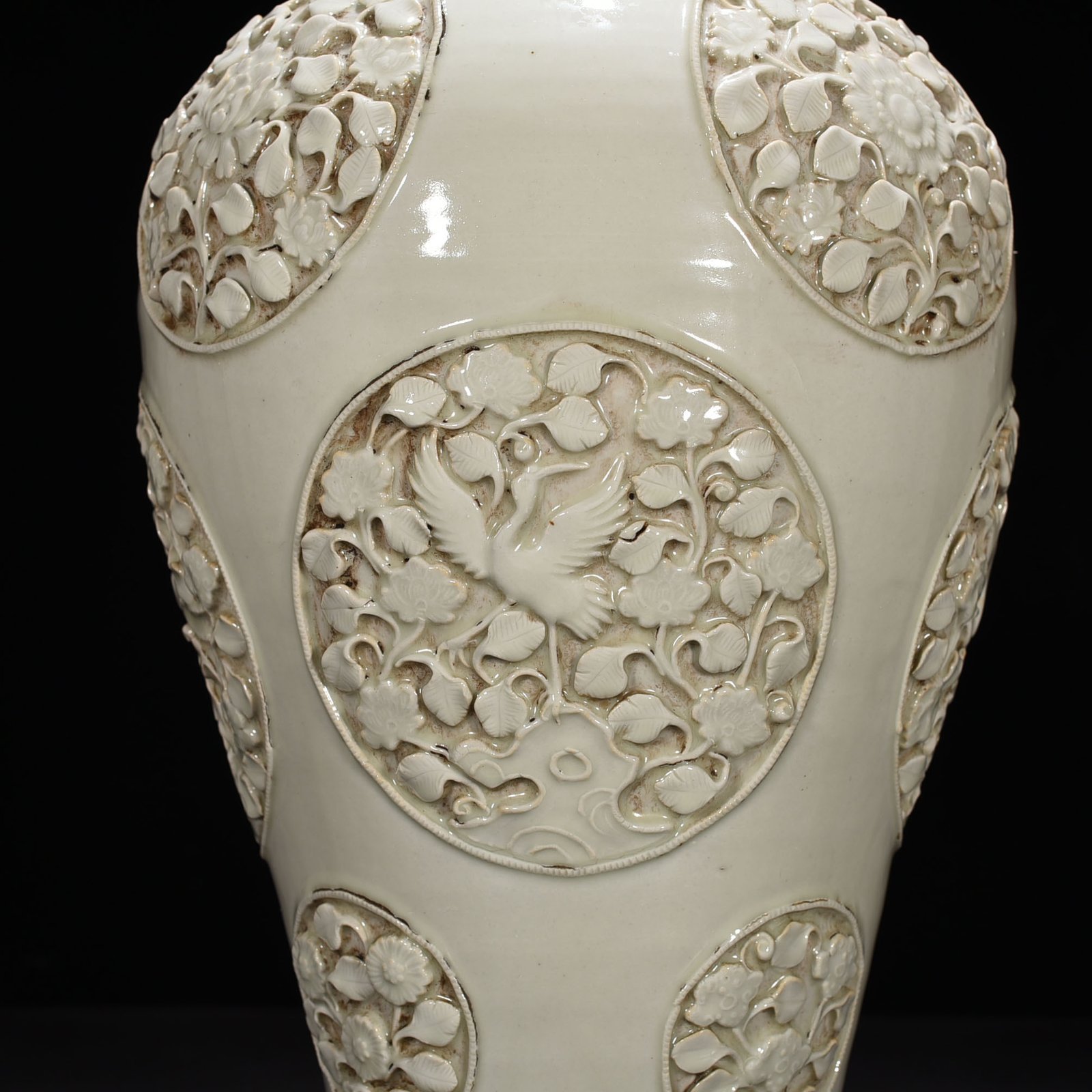 Yuan Dynasty white glazed plum vase with flower and bird patterns