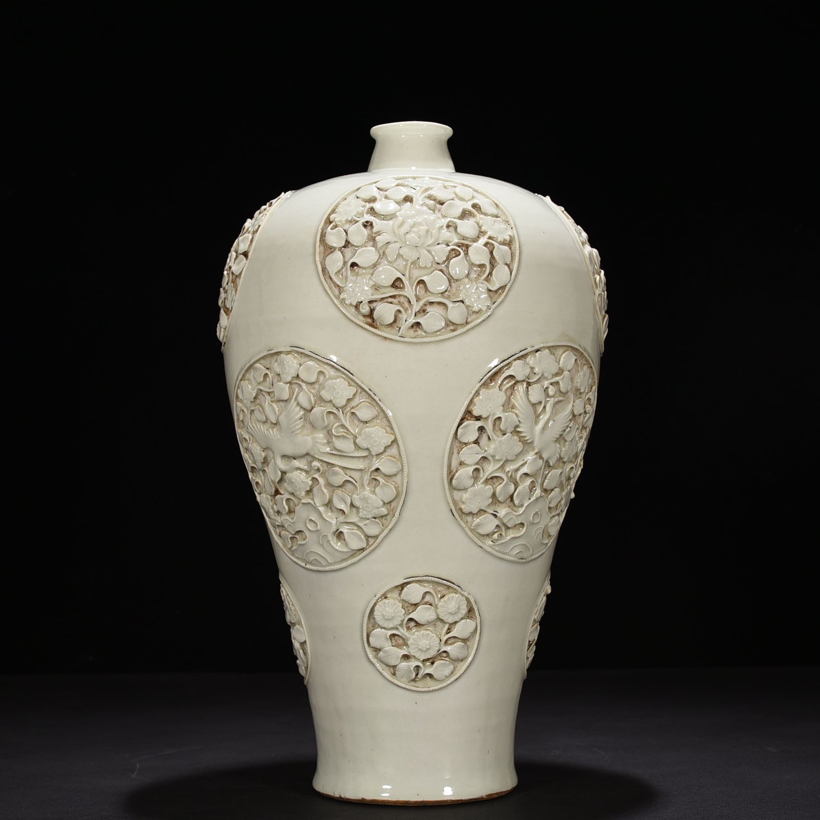 Yuan Dynasty white glazed plum vase with flower and bird patterns