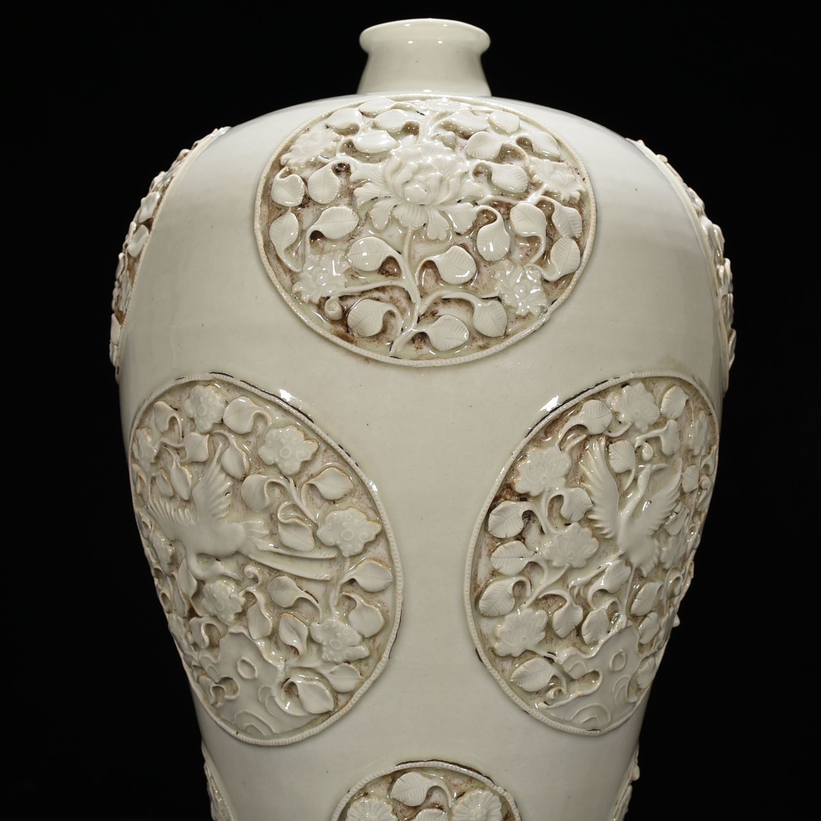 Yuan Dynasty white glazed plum vase with flower and bird patterns