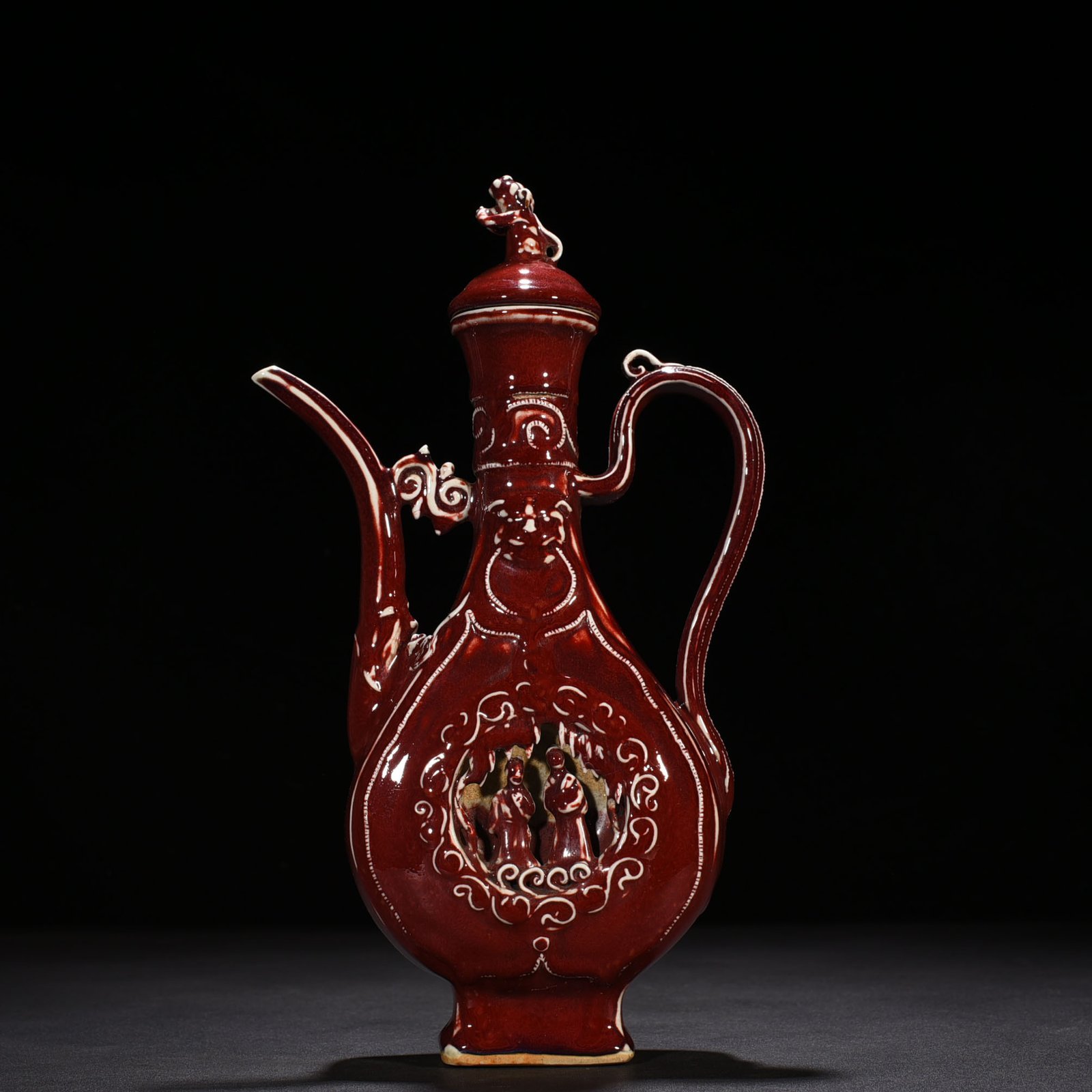 Yuan Dynasty ruby ​​red glaze hollow figure holding pot