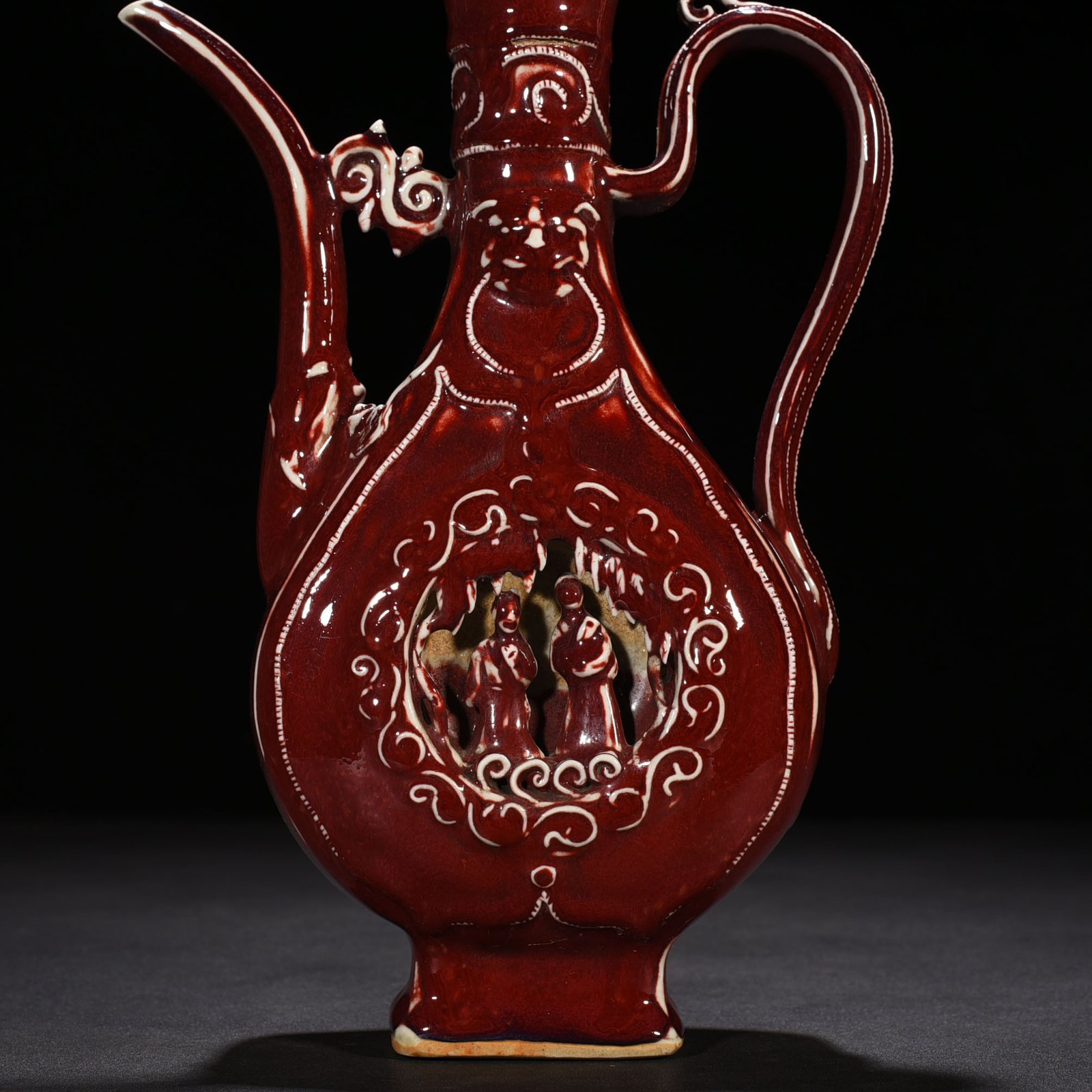Yuan Dynasty ruby ​​red glaze hollow figure holding pot