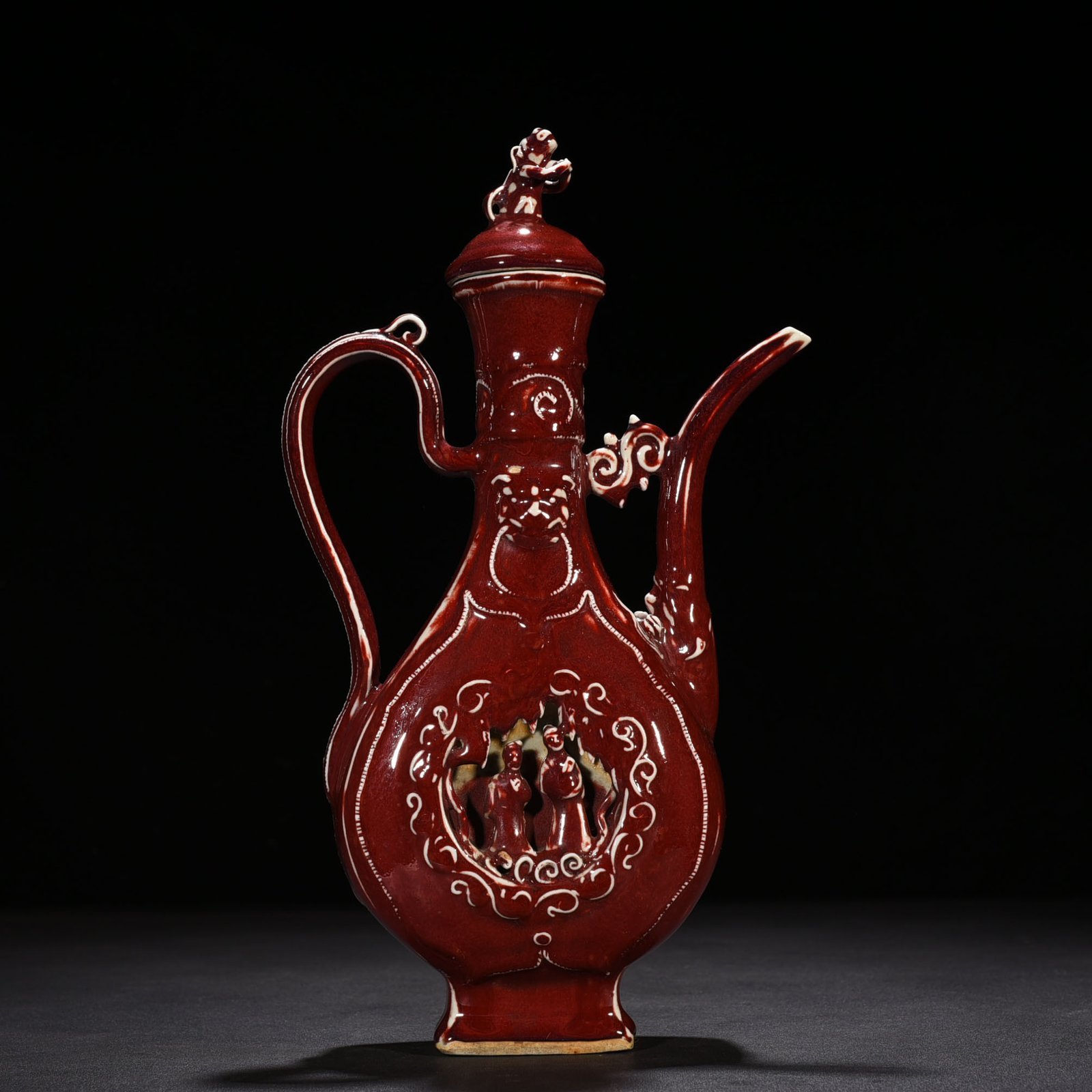Yuan Dynasty ruby ​​red glaze hollow figure holding pot