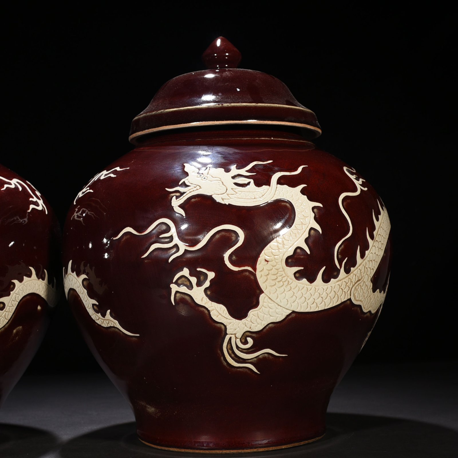 Yuan Dynasty red glaze engraved white dragon cover jar