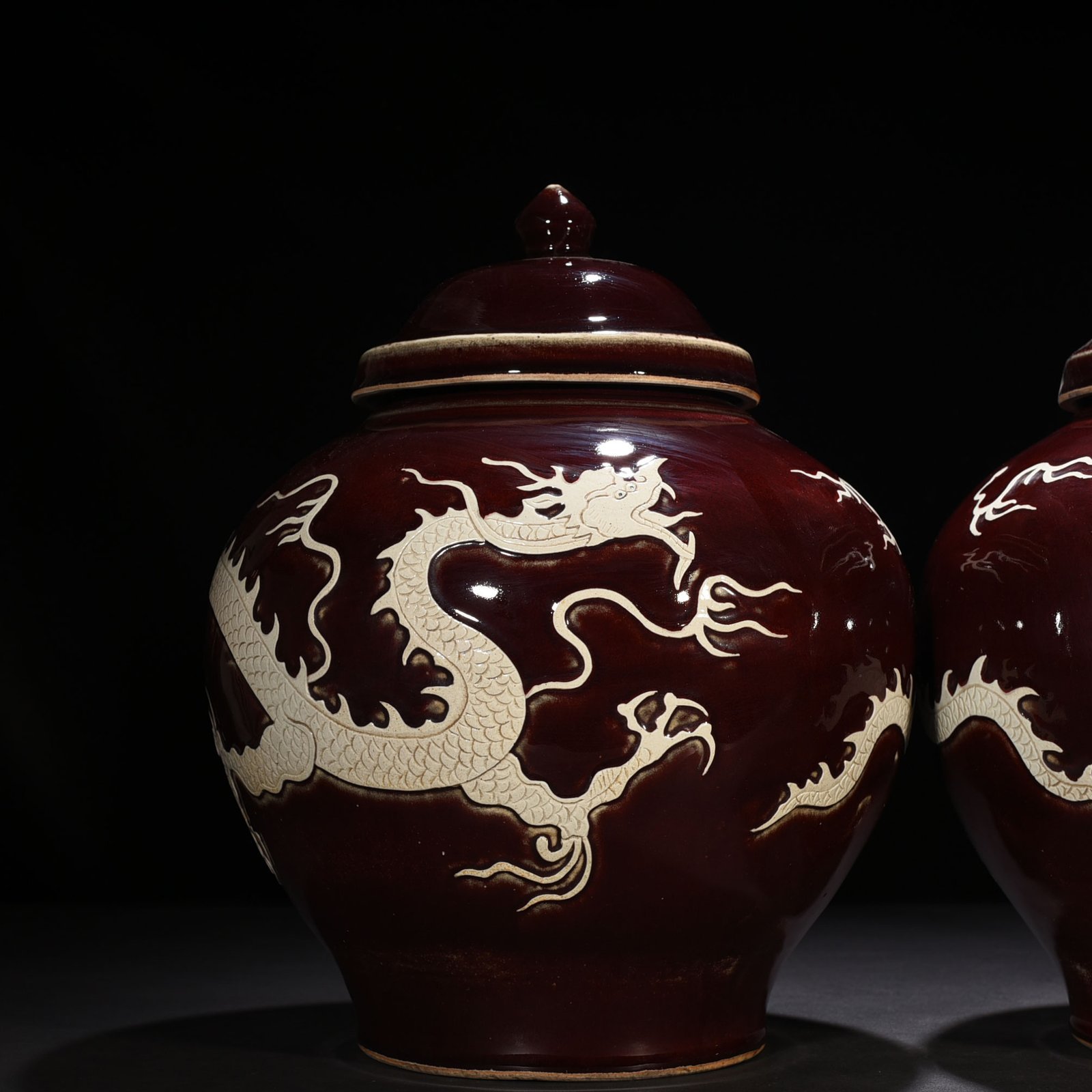 Yuan Dynasty red glaze engraved white dragon cover jar