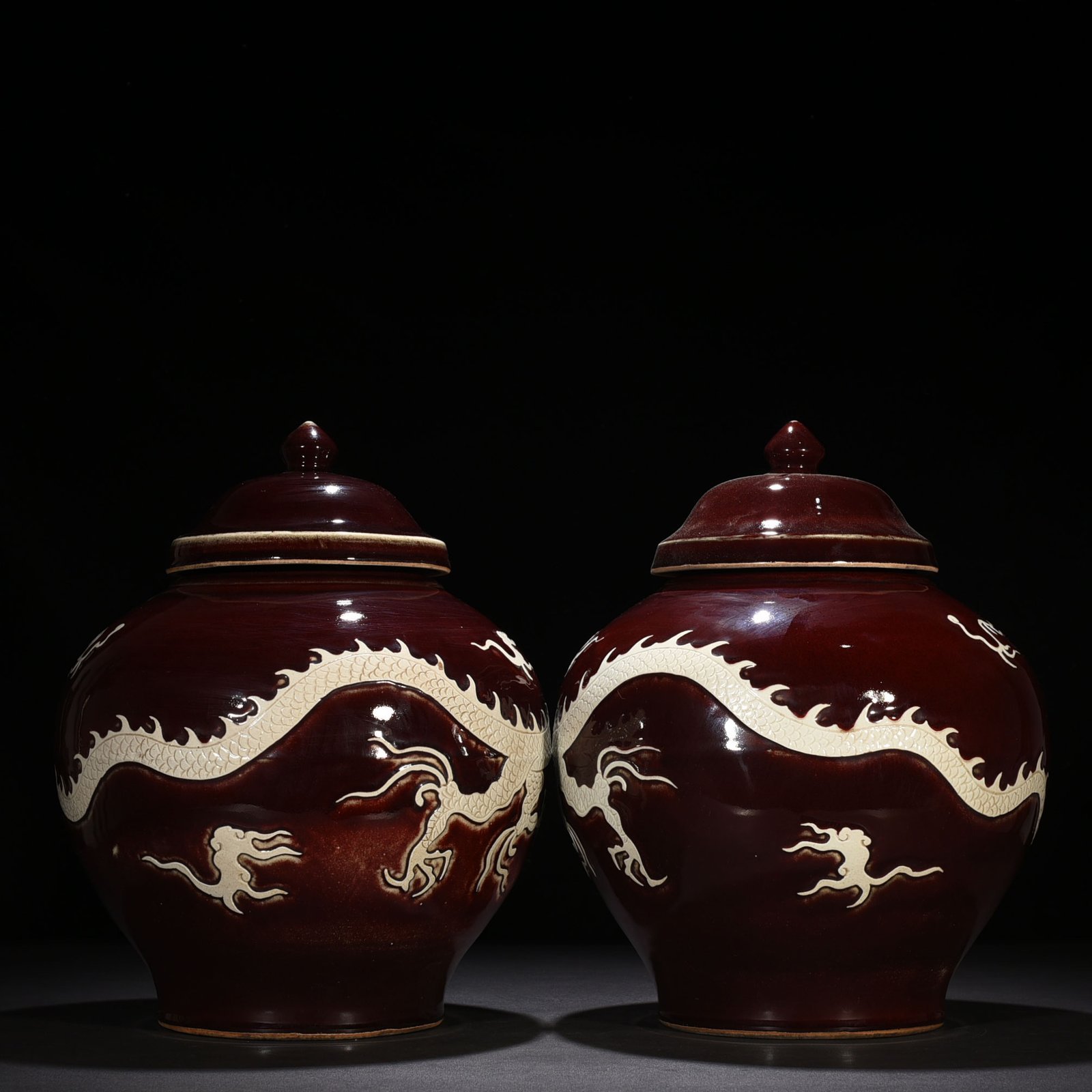 Yuan Dynasty red glaze engraved white dragon cover jar