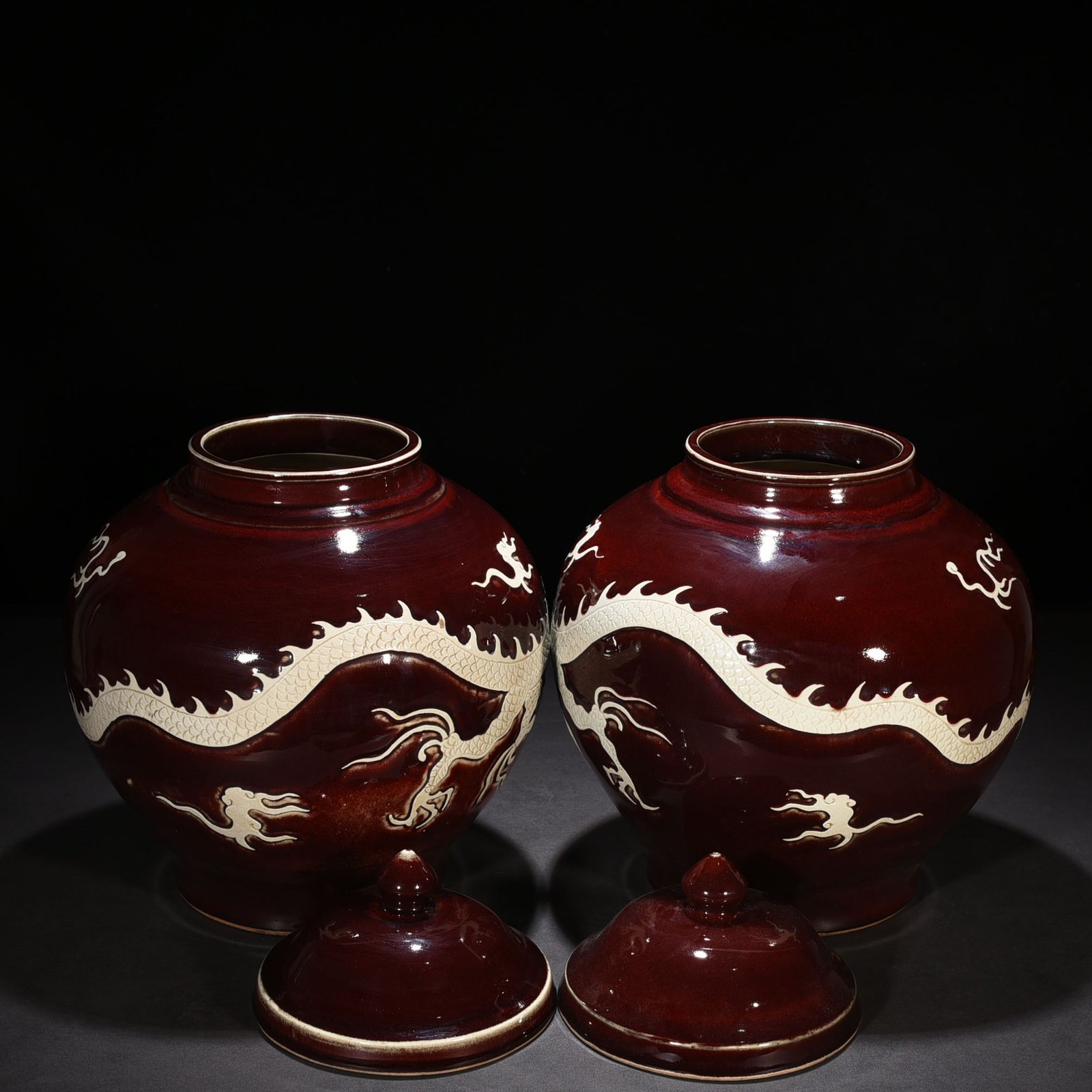 Yuan Dynasty red glaze engraved white dragon cover jar