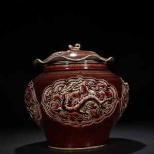 Yuan Dynasty red glaze embossed dragon pattern lotus leaf lid jar