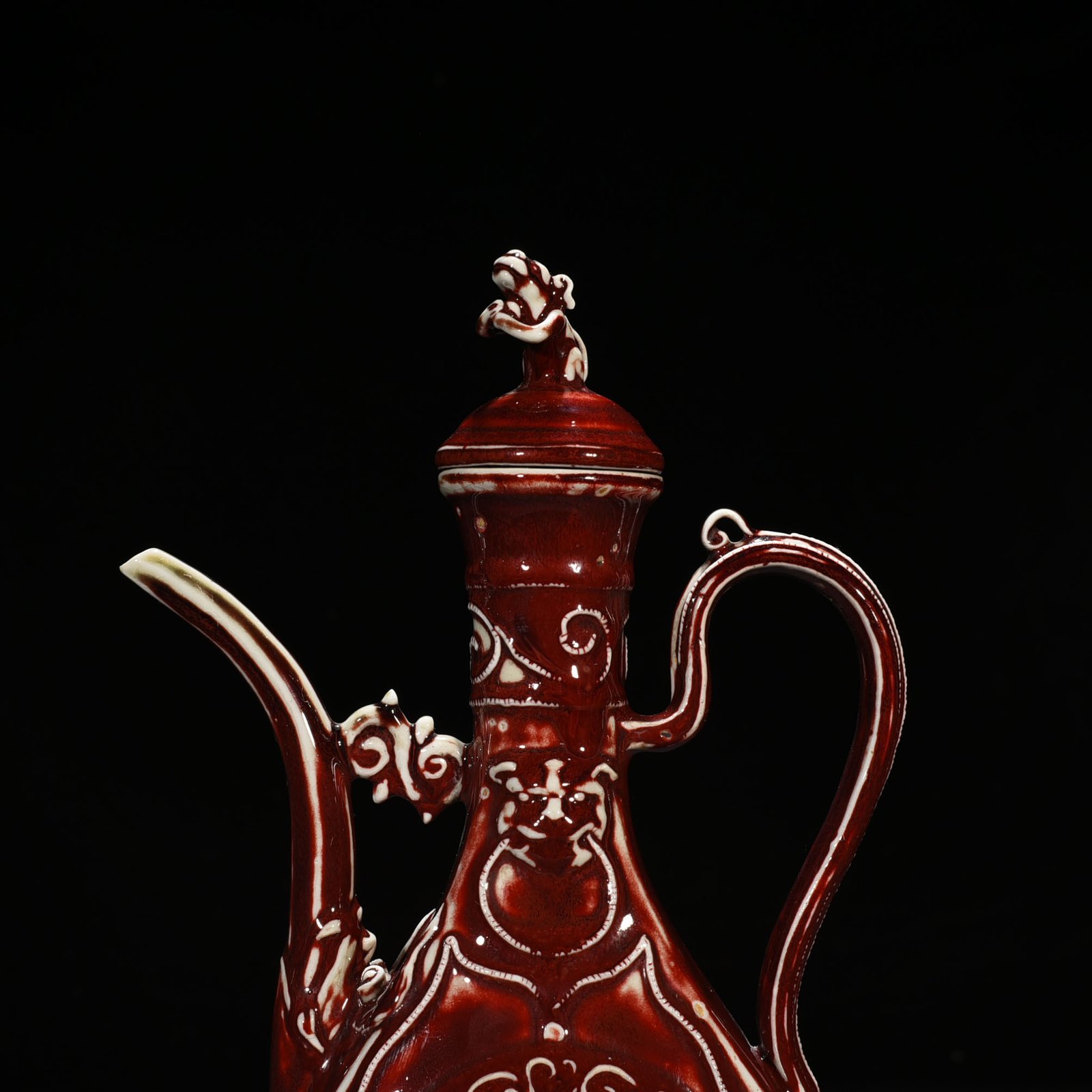 Yuan Dynasty red glaze hollow figure pattern holding pot