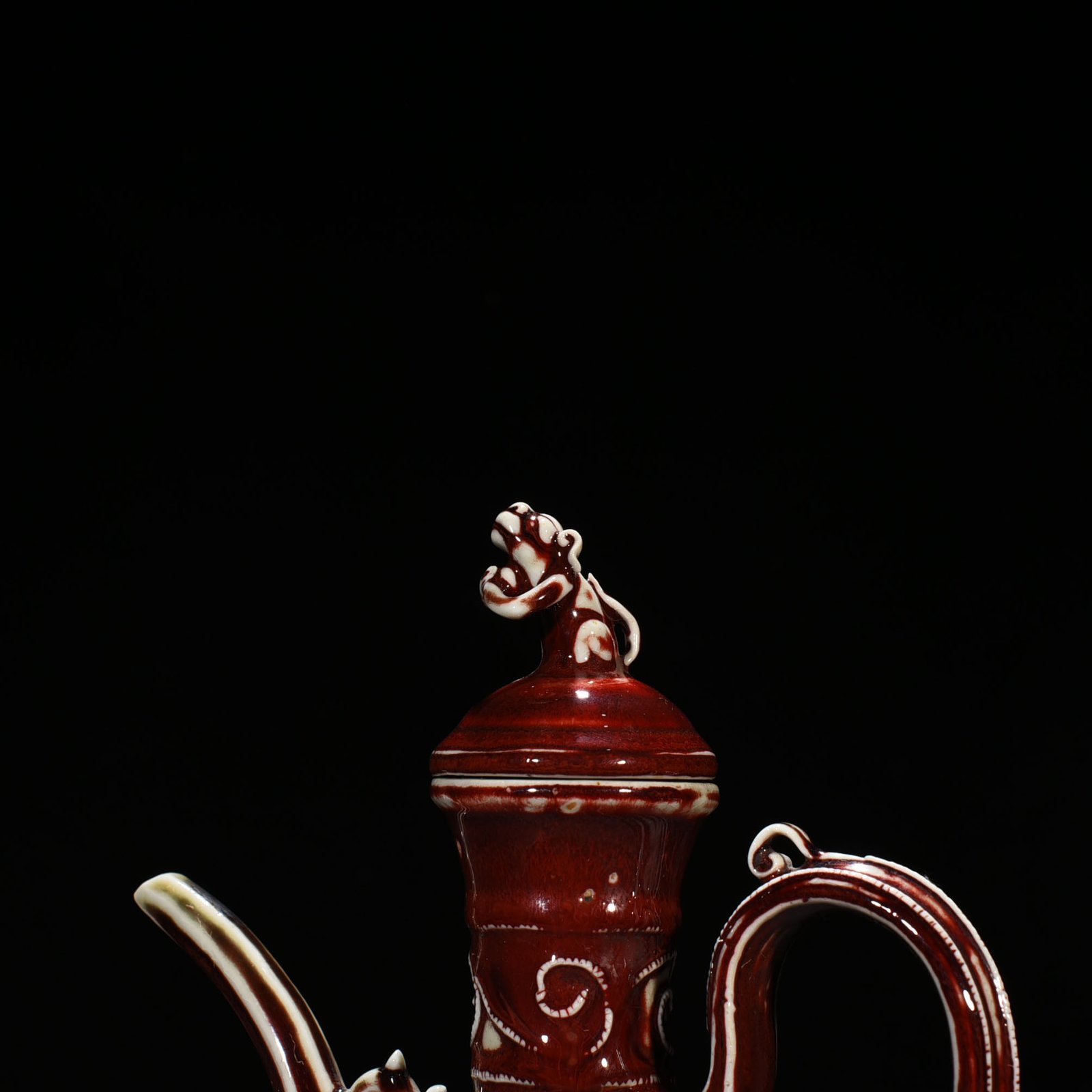 Yuan Dynasty red glaze hollow figure pattern holding pot