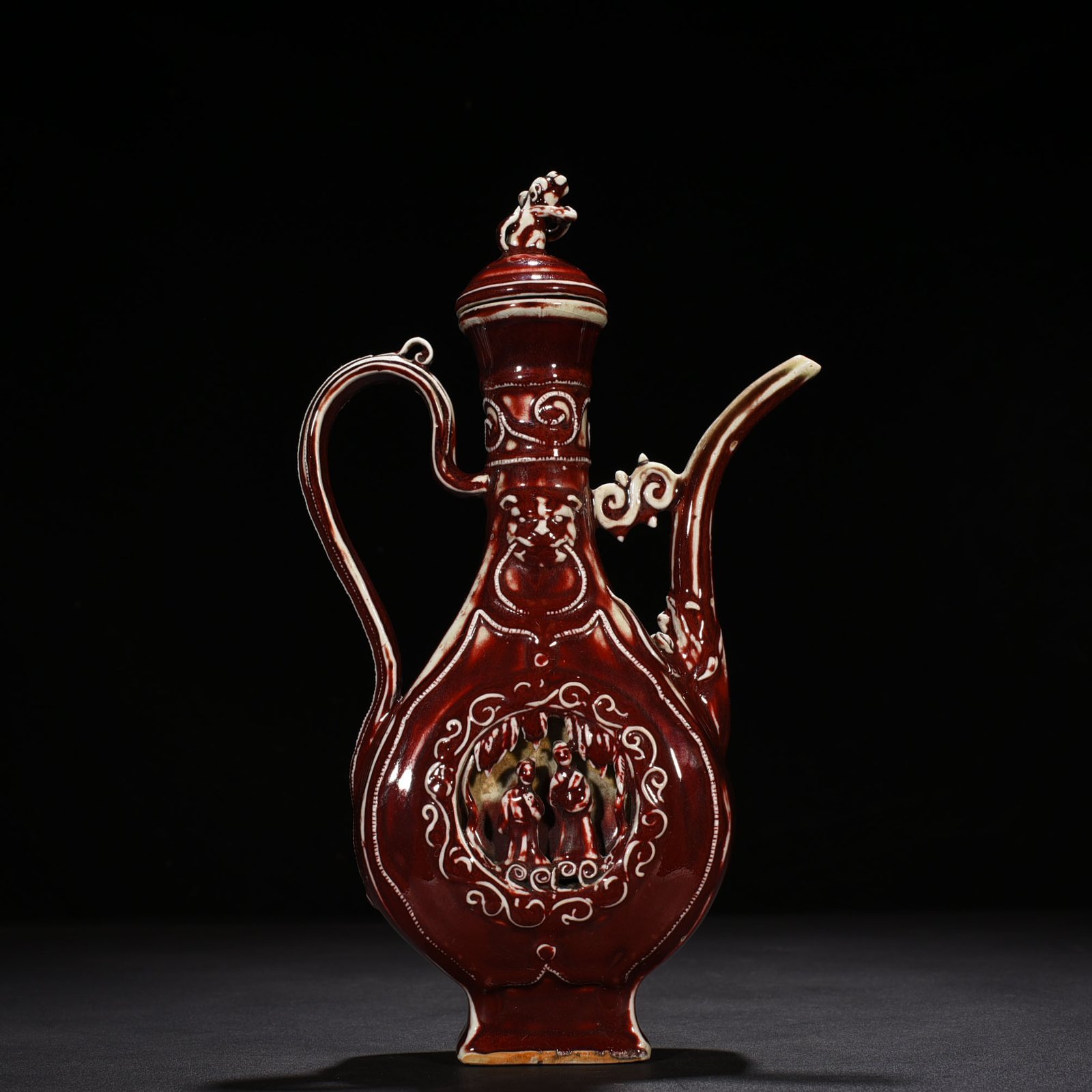 Yuan Dynasty red glaze hollow figure pattern holding pot