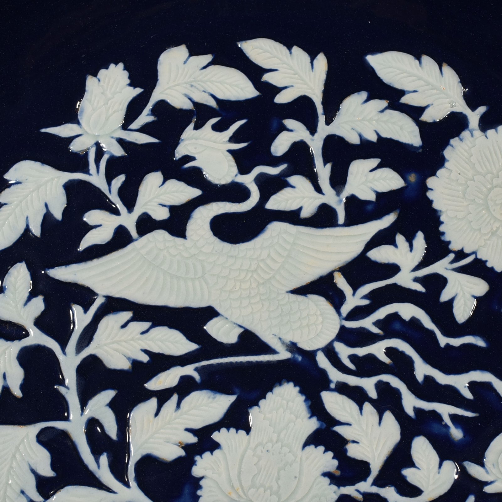 Yuan Dynasty blue glaze engraved phoenix and peony pattern rhombus edge folding plate