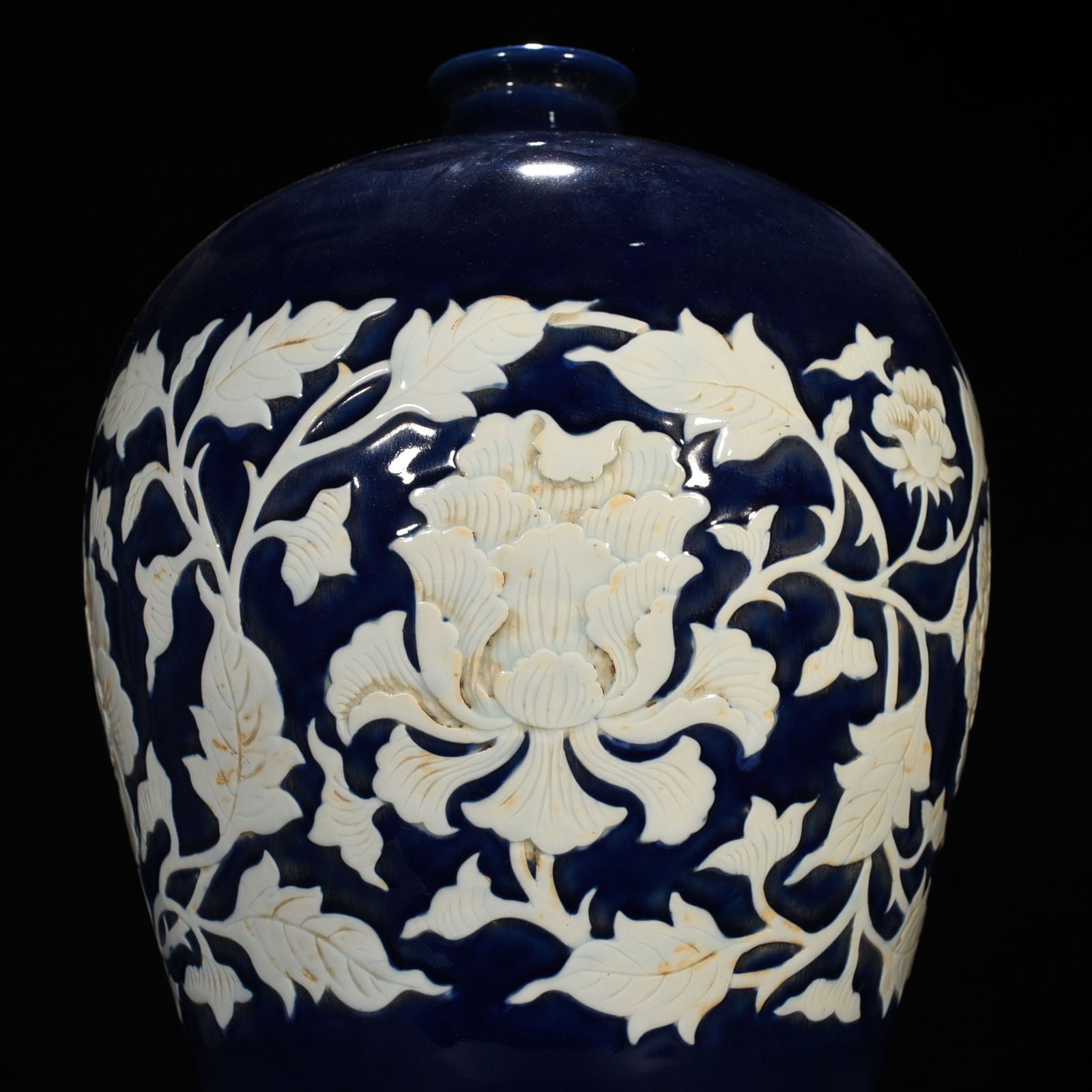 Yuan Dynasty blue glaze carved white plum vase with branches and peony pattern