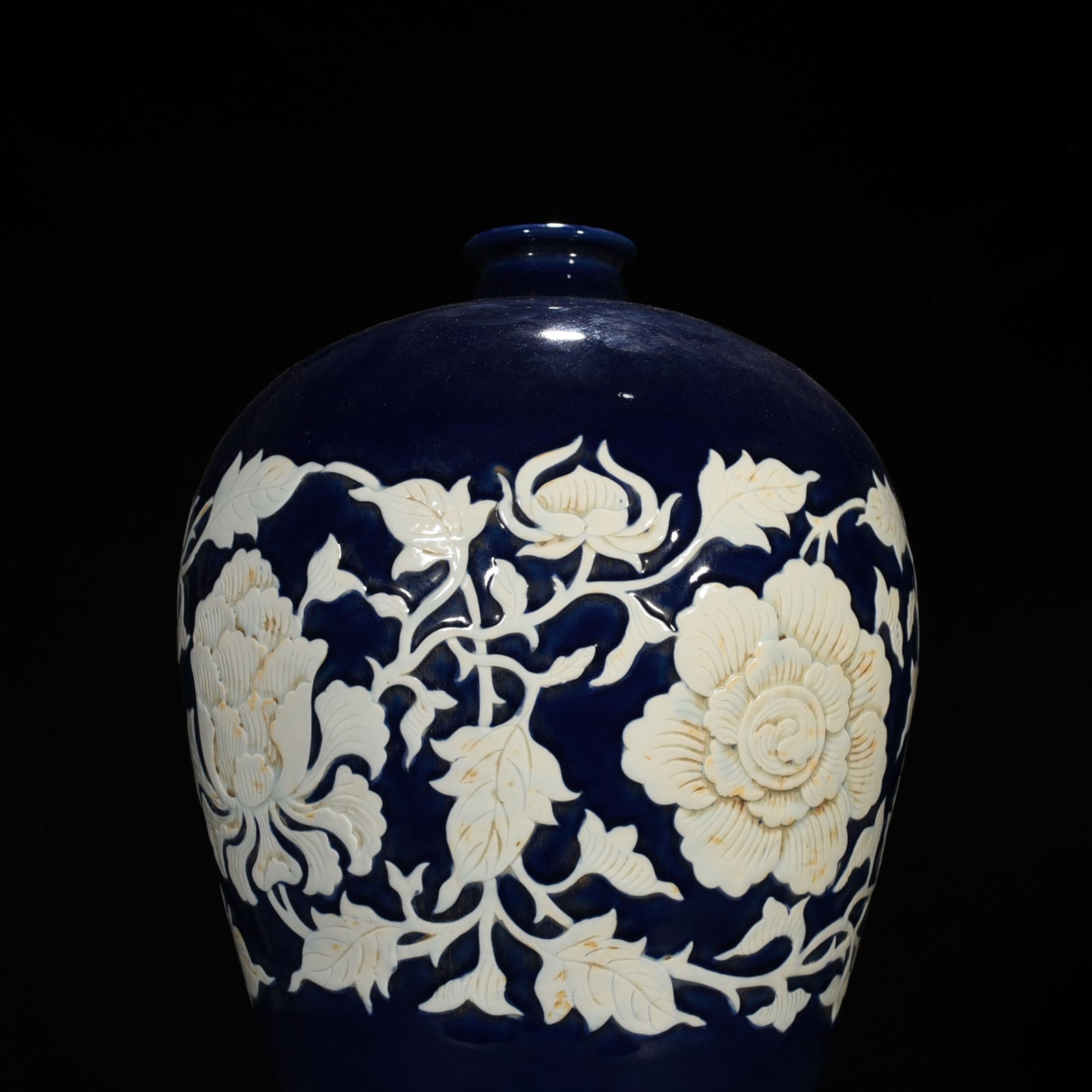 Yuan Dynasty blue glaze carved white plum vase with branches and peony pattern