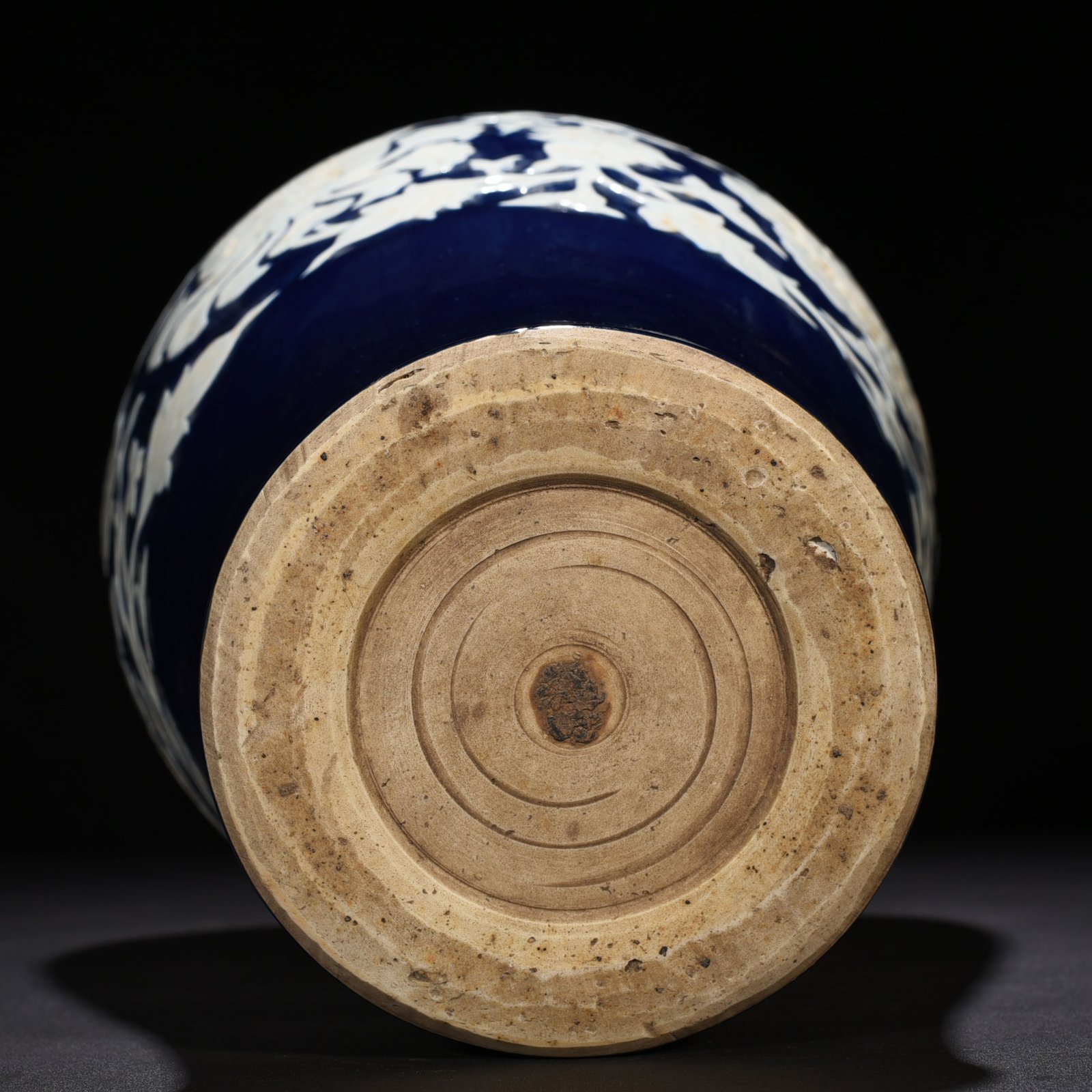 Yuan Dynasty blue glaze carved white plum vase with branches and peony pattern