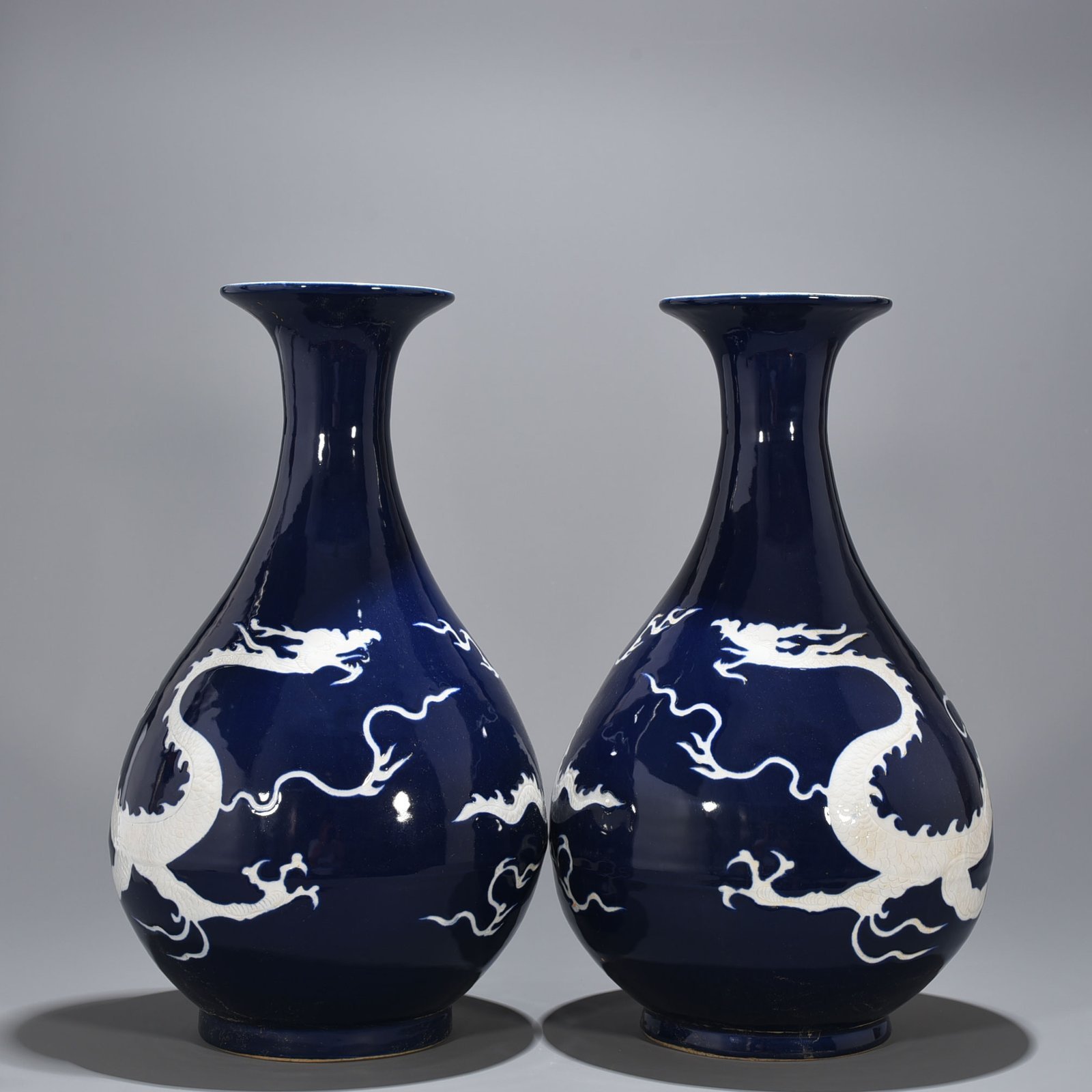 Yuan Dynasty blue glaze jade pot and spring vase with white dragon pattern