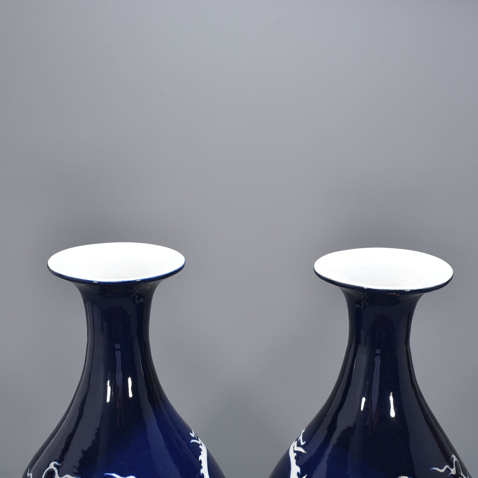 Yuan Dynasty blue glaze jade pot and spring vase with white dragon pattern