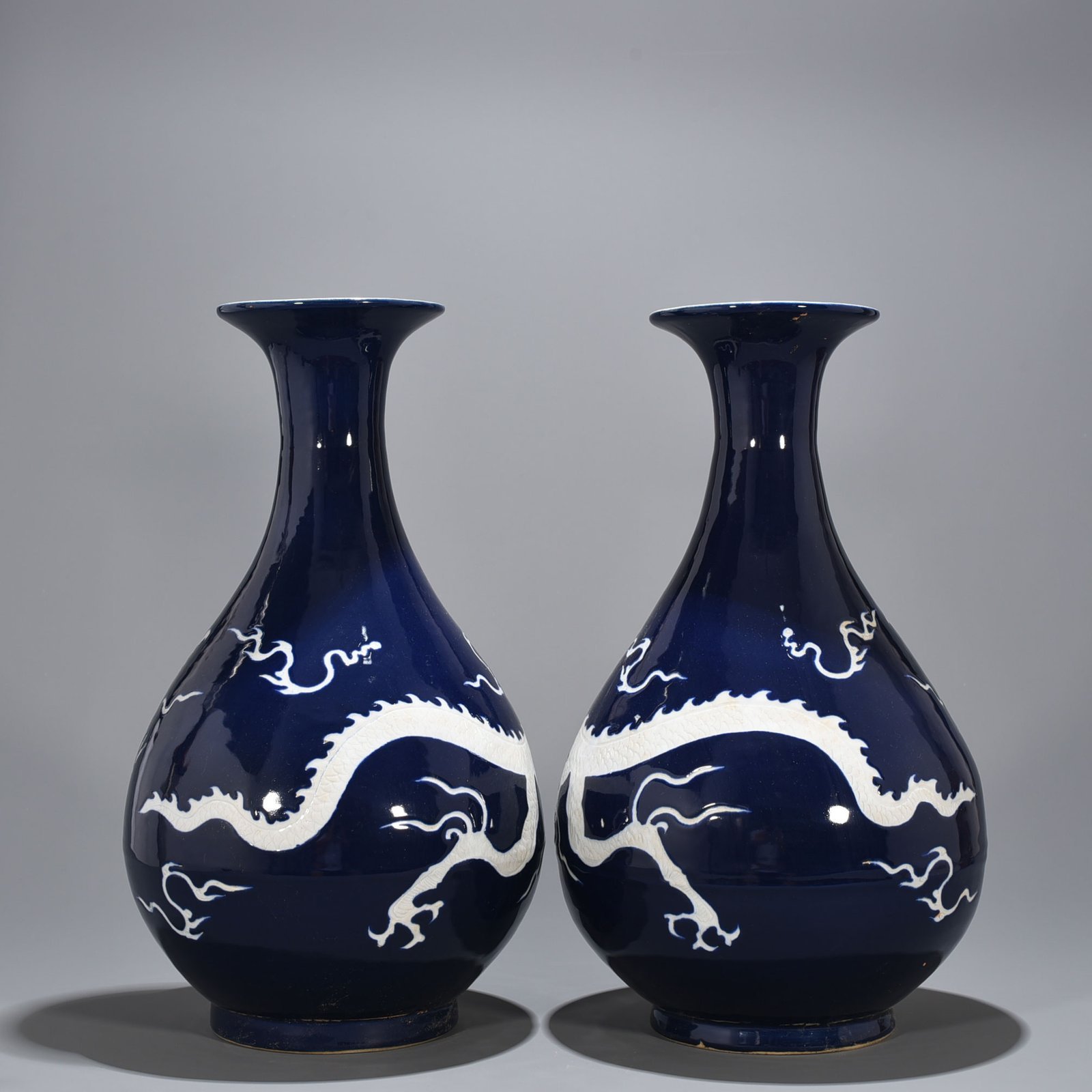 Yuan Dynasty blue glaze jade pot and spring vase with white dragon pattern