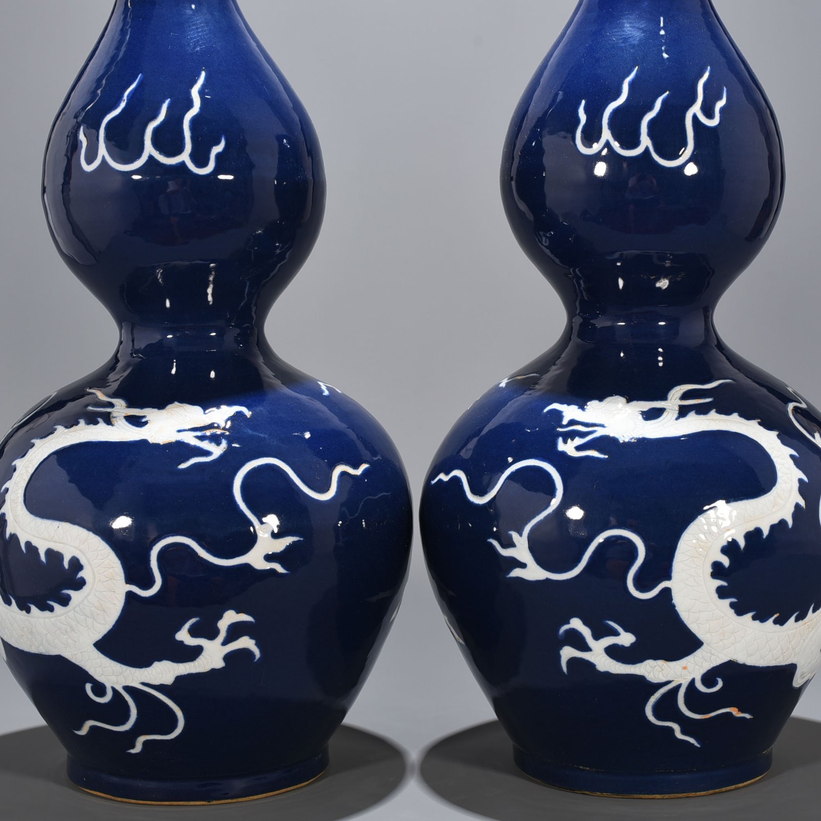 Yuan Dynasty blue glaze gourd vase with white dragon pattern