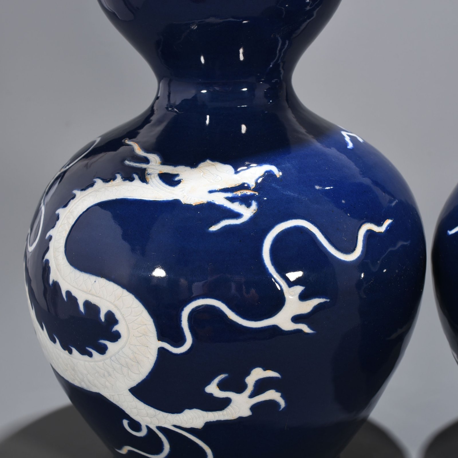 Yuan Dynasty blue glaze gourd vase with white dragon pattern