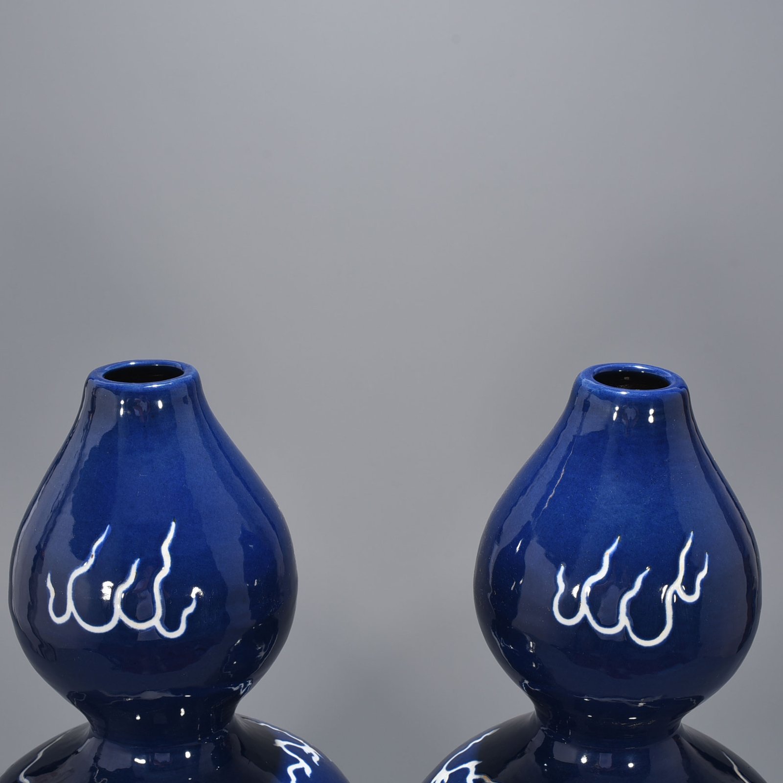 Yuan Dynasty blue glaze gourd vase with white dragon pattern