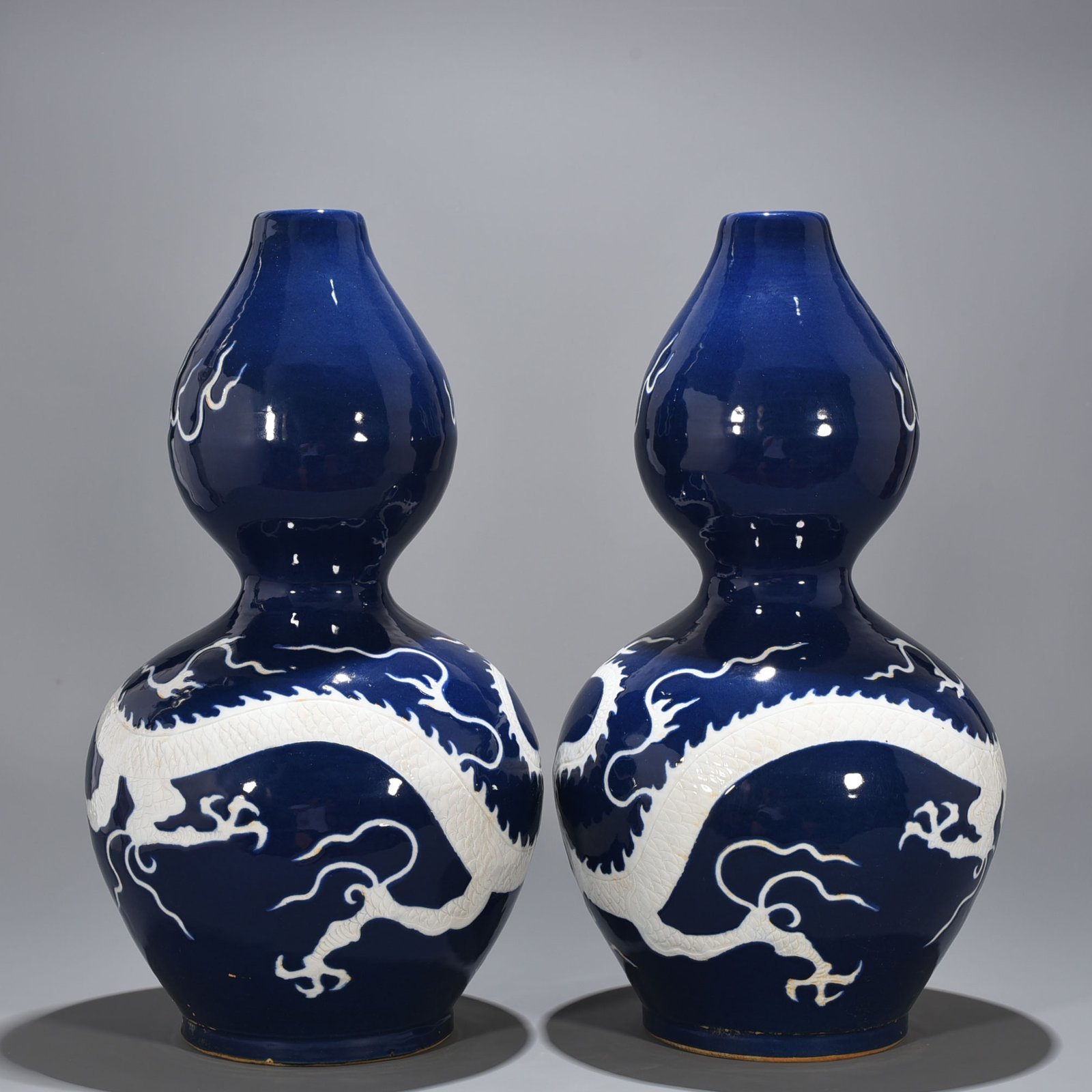 Yuan Dynasty blue glaze gourd vase with white dragon pattern