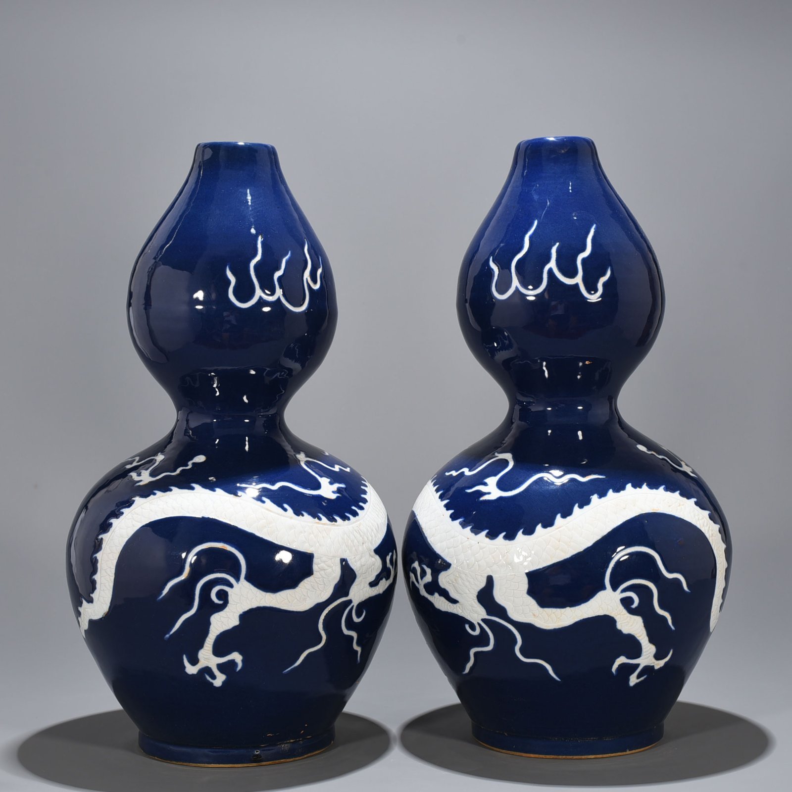 Yuan Dynasty blue glaze gourd vase with white dragon pattern