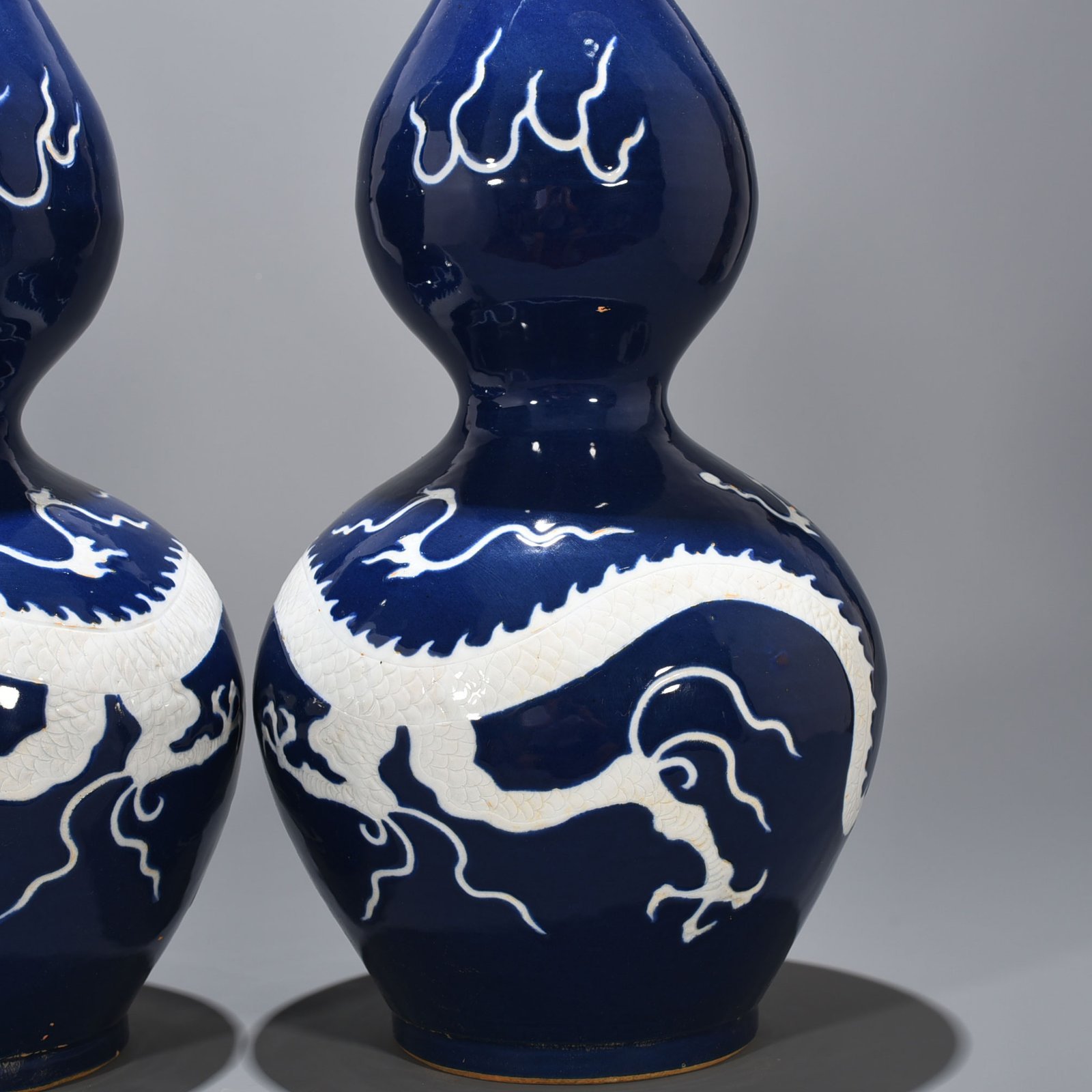 Yuan Dynasty blue glaze gourd vase with white dragon pattern