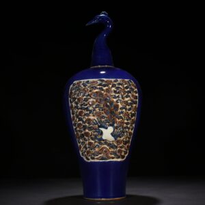 Yuan Dynasty blue glaze laminated blue and white plum vase with red underglaze peacock and peony pattern