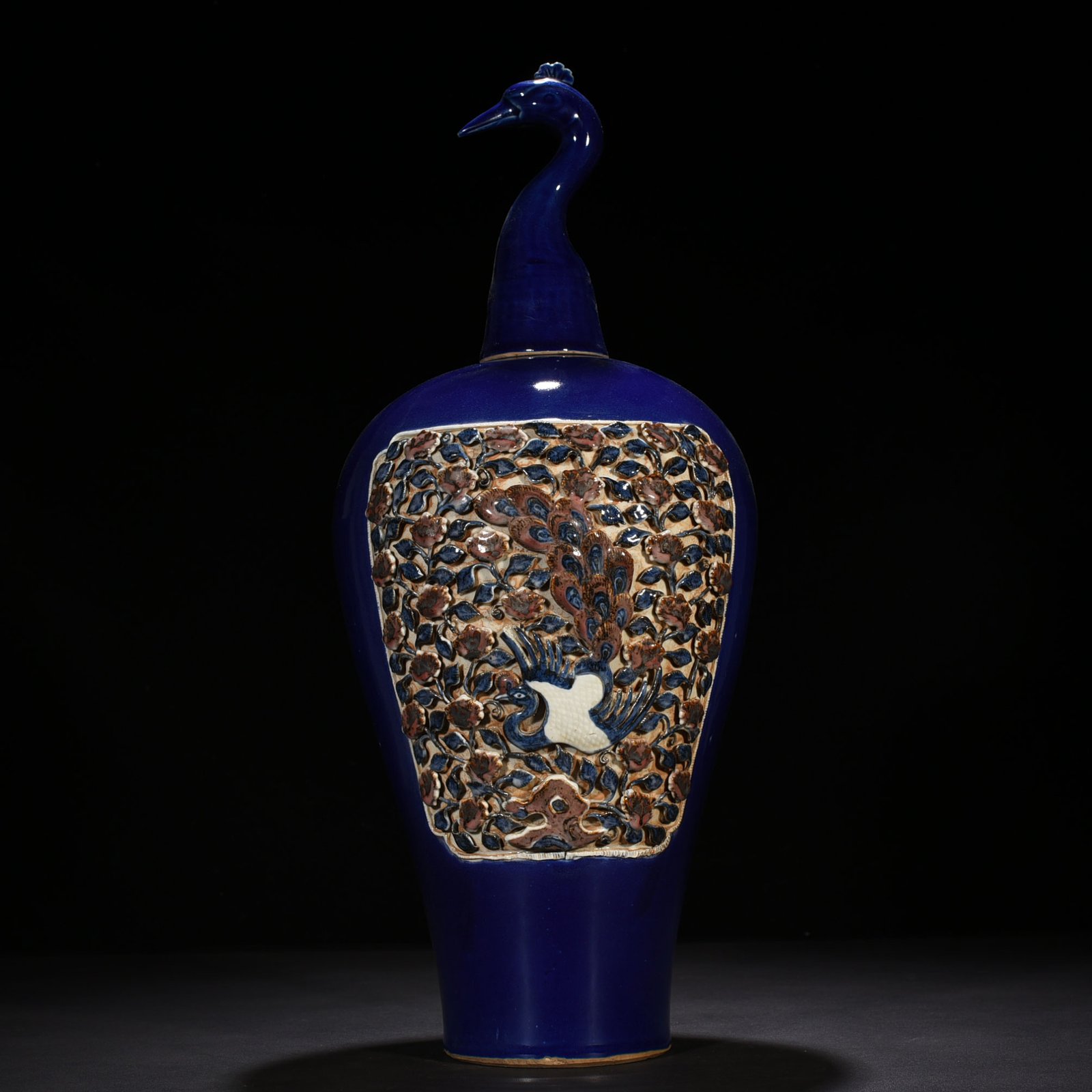Yuan Dynasty blue glaze laminated blue and white plum vase with red underglaze peacock and peony pattern
