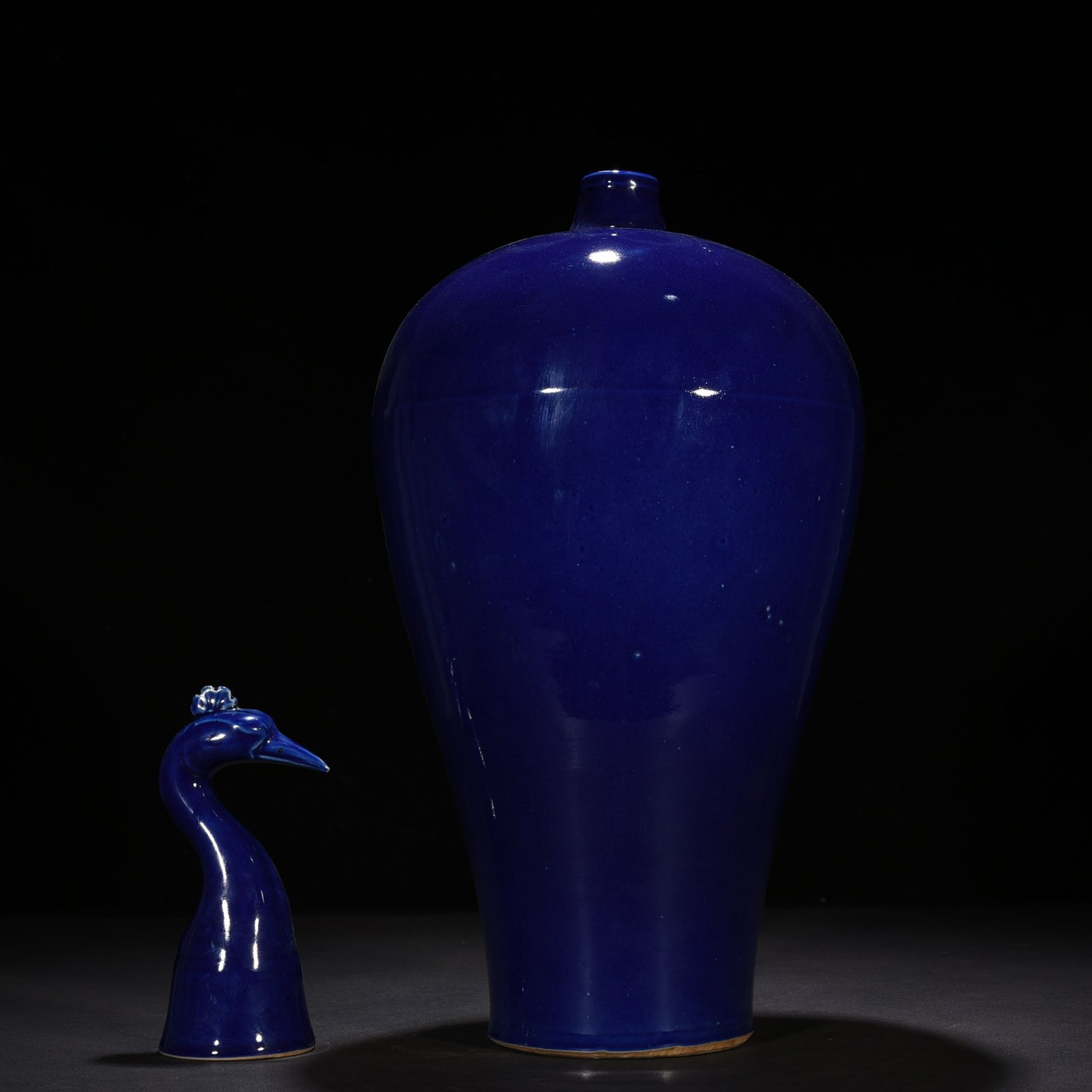 Yuan Dynasty blue glaze laminated blue and white plum vase with red underglaze peacock and peony pattern