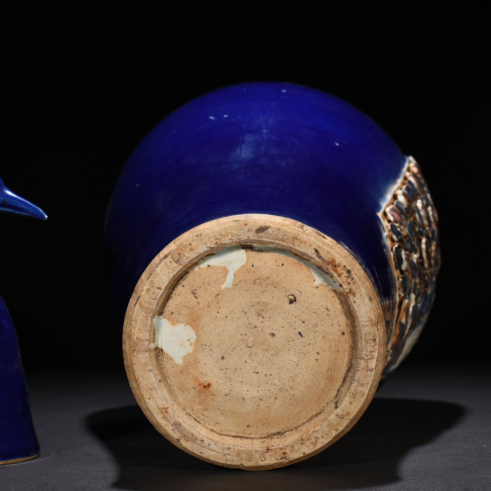 Yuan Dynasty blue glaze laminated blue and white plum vase with red underglaze peacock and peony pattern