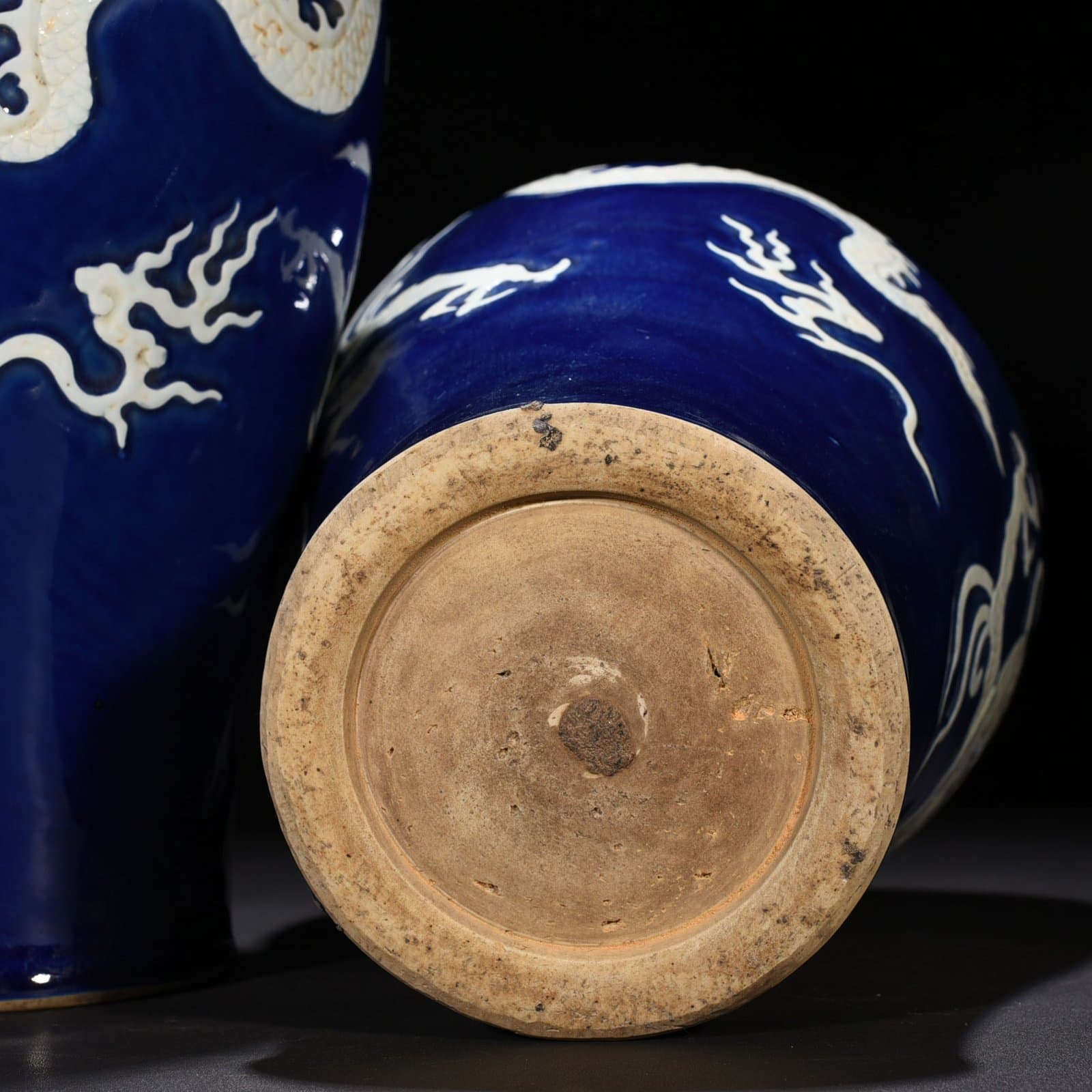 Yuan Dynasty blue glaze carved plum vase with white dragon pattern