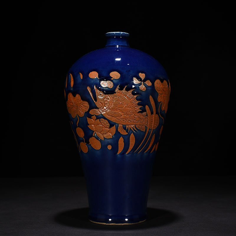 Yuan Dynasty blue glaze carved fish and algae pattern plum vase