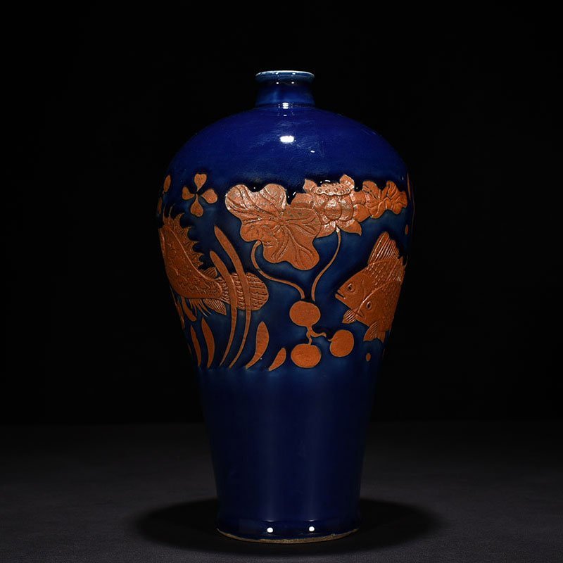 Yuan Dynasty blue glaze carved fish and algae pattern plum vase