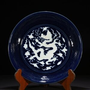Yuan Dynasty blue glaze carved dragon plate