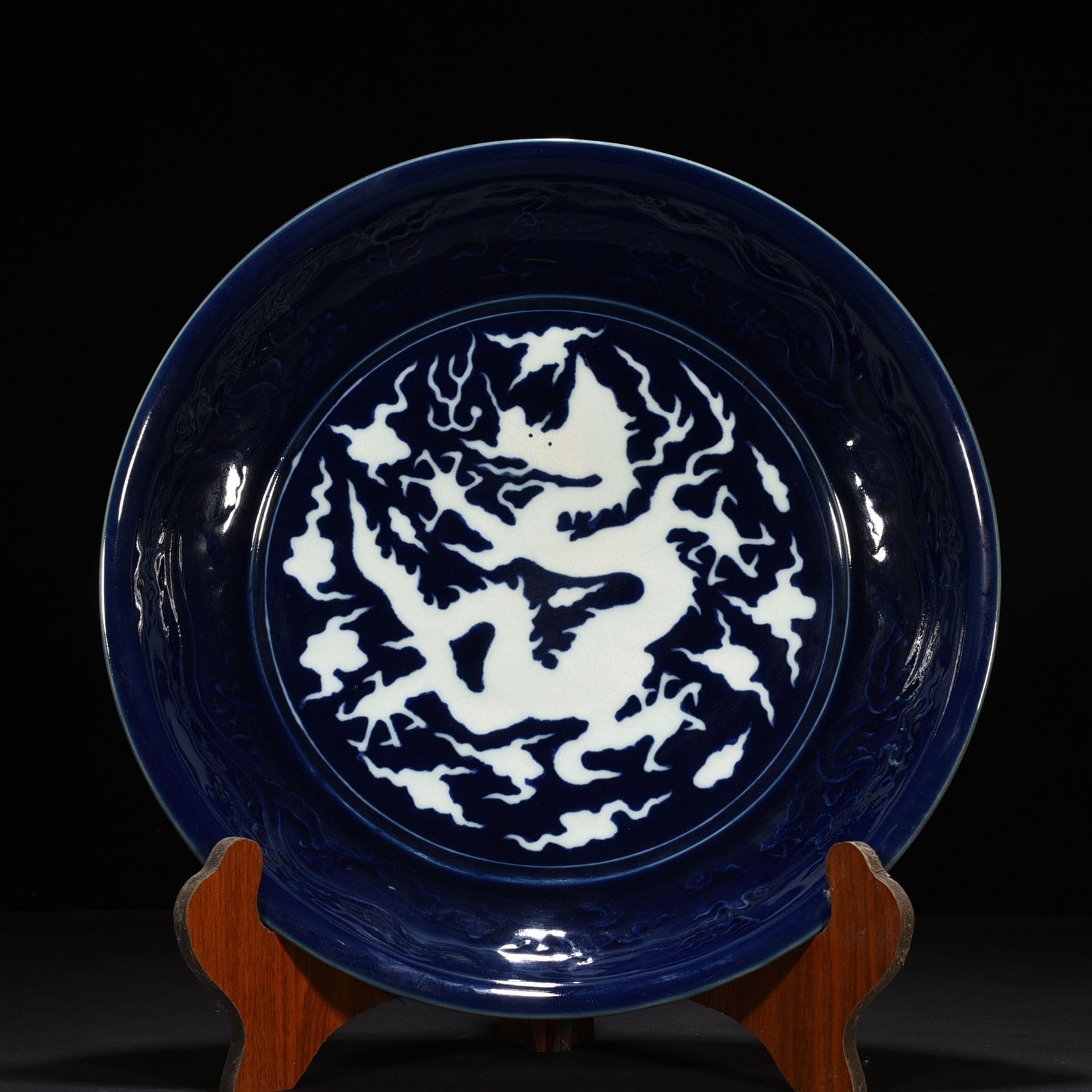 Yuan Dynasty blue glaze carved dragon plate