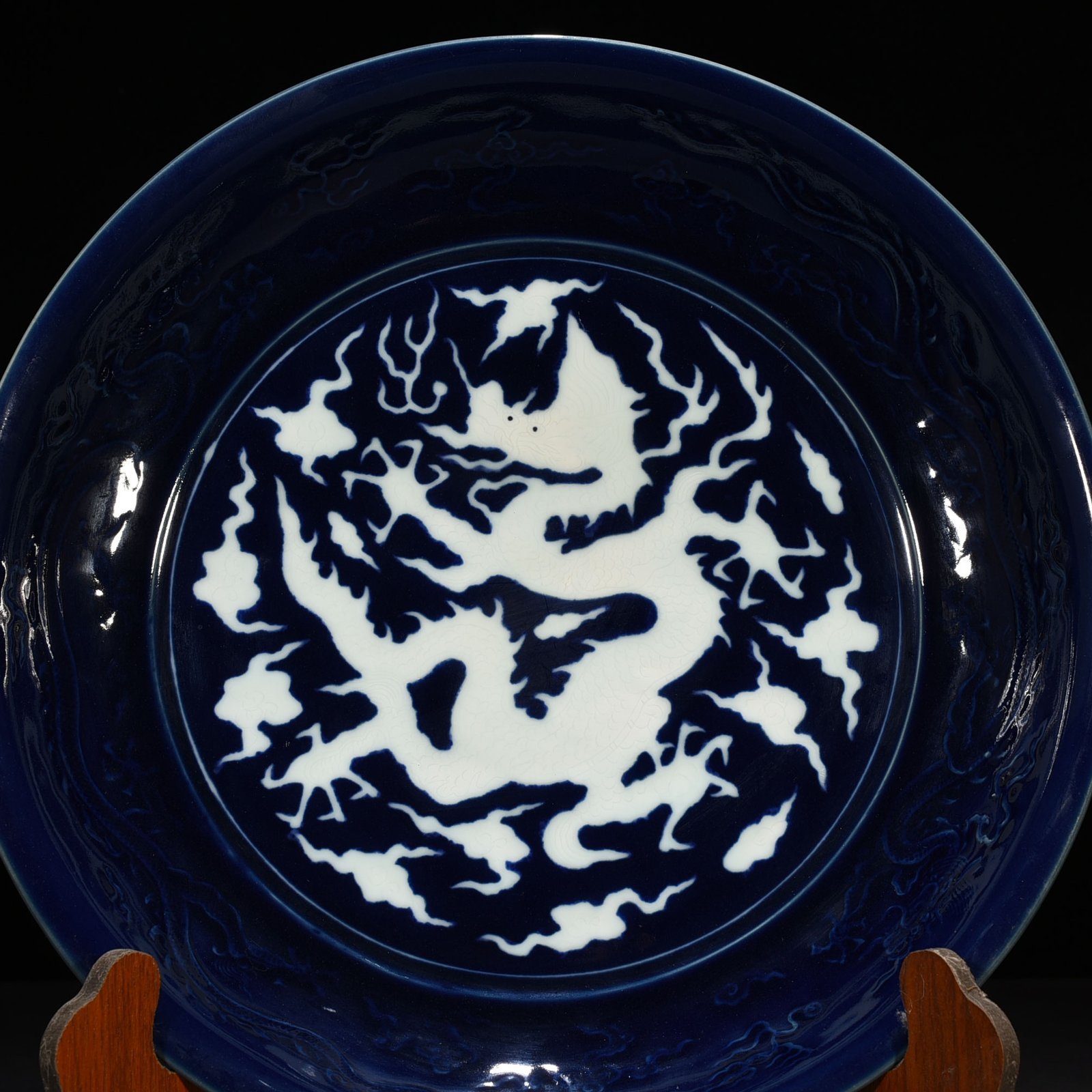 Yuan Dynasty blue glaze carved dragon plate